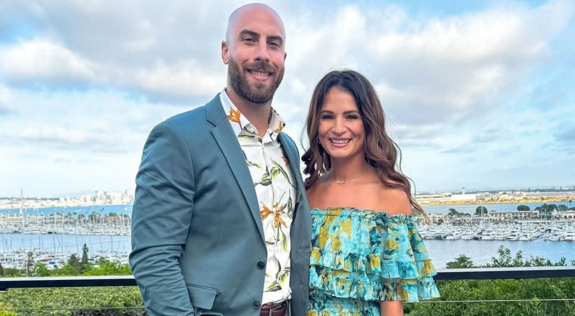 Anthony Bass holds wife Sydney close as duo strike adorable pose against romantic background