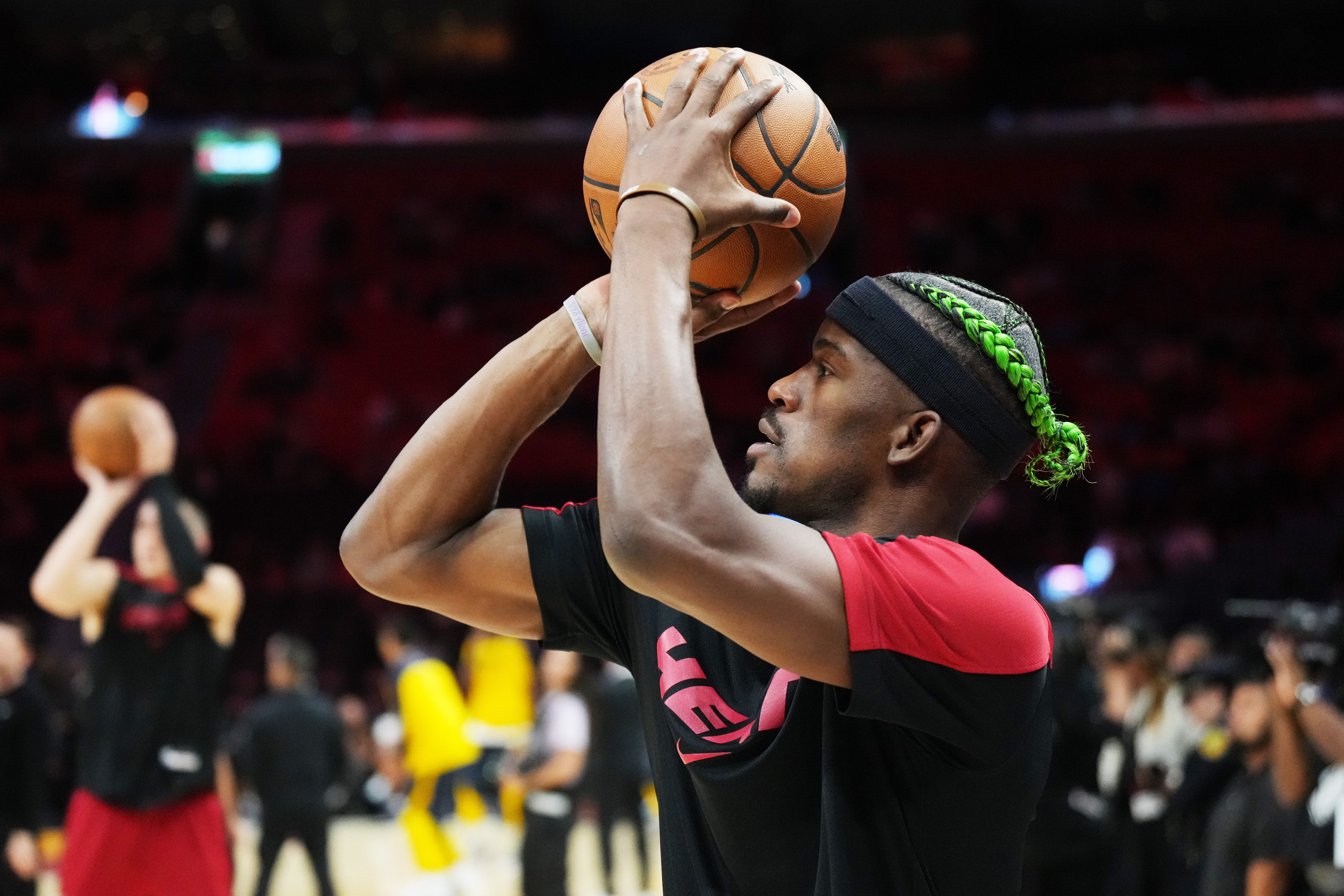 Miami Heat forward Jimmy Butler (22) warms up before an NBA game. (Credits: IMAGN)