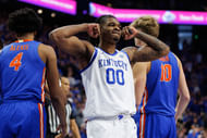 Kentucky Wildcats guard Otega Oweh (#00) celebrates a basket by center Amari Williams during the second half against the Florida Gators at Rupp Arena. Photo: Imagn