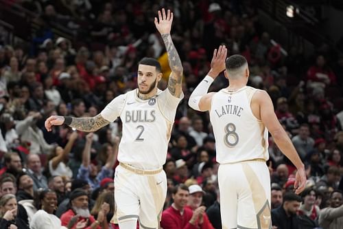 Chicago Bulls guard Lonzo Ball high-fives guard Zach LaVine after making a three-point basket against the New York Knicks during the second half at United Center. Mandatory Credit: David Banks-Imagn Images Imagn