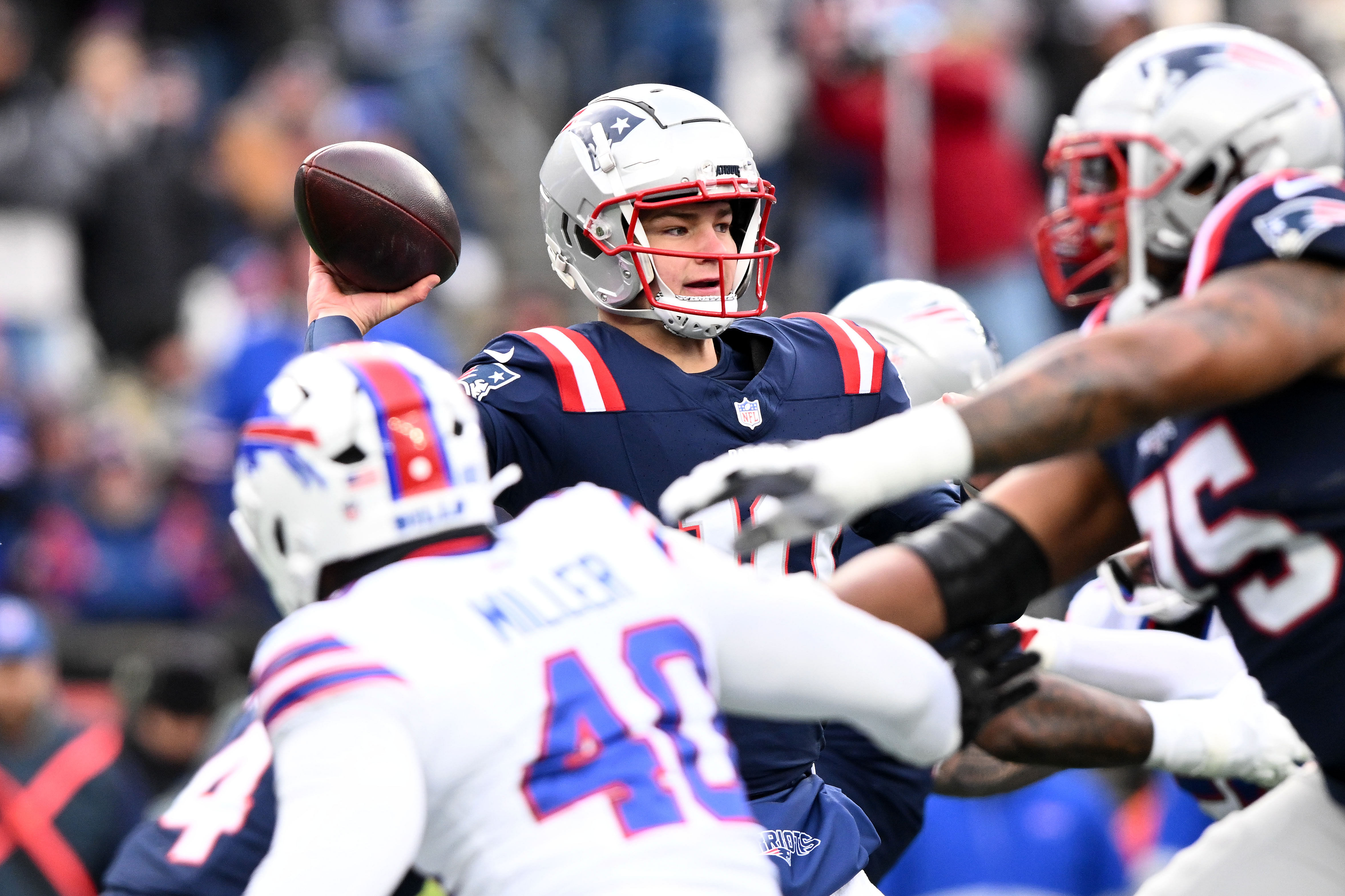 New England Patriots quarterback Drake Maye (10) looks to throw against the Buffalo Bills during their NFL game. (Credits: IMAGN)