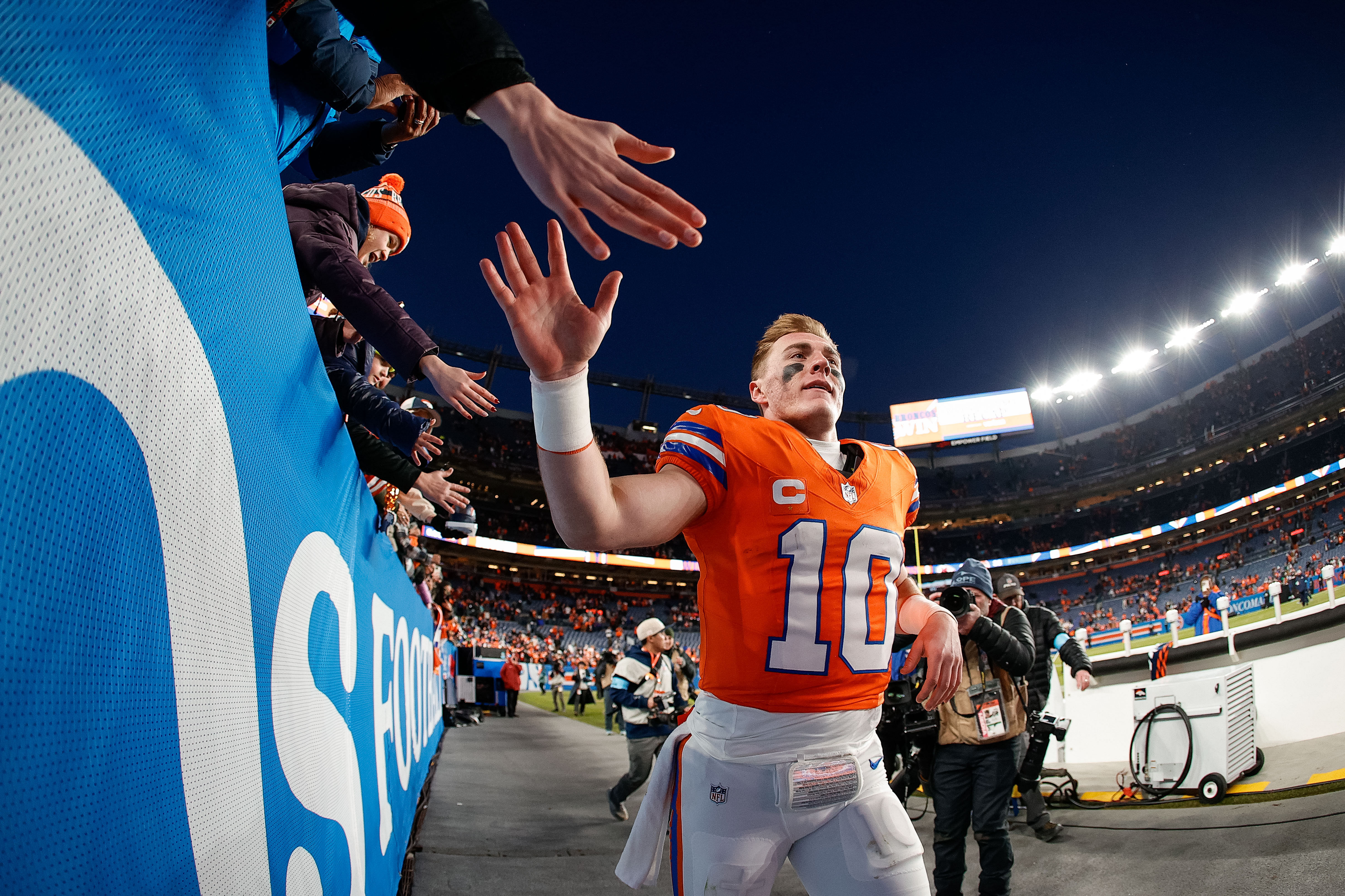 NFL: Denver Broncos quarterback Bo Nix celebrates with fans - Source: Imagn