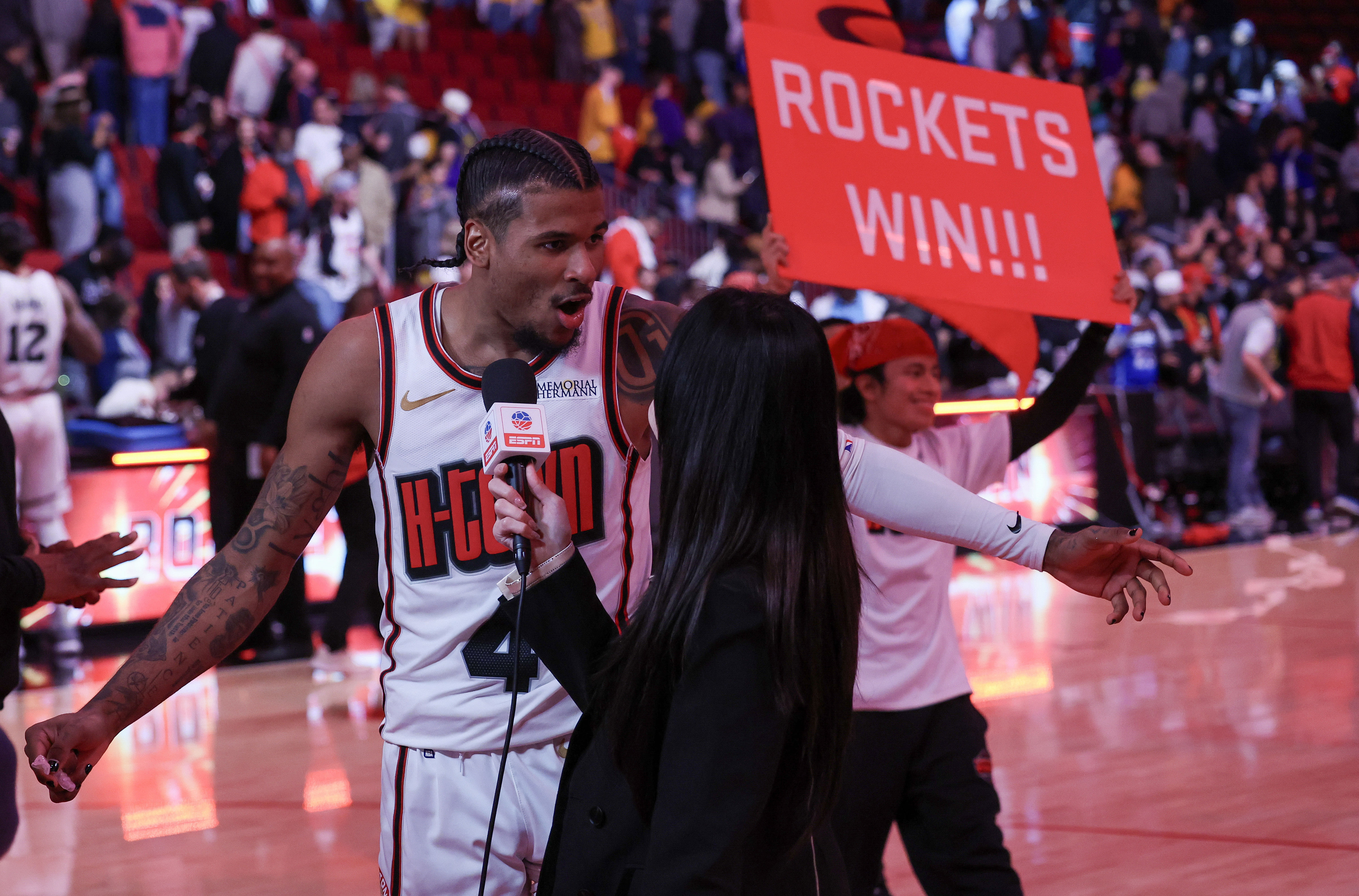 Jan 5, 2025; Houston, Texas, USA; Houston Rockets guard Jalen Green (4) talks to a reporter after defeating the Los Angeles Lakers at Toyota Center. Mandatory Credit: Thomas Shea-Imagn Images - Source: Imagn