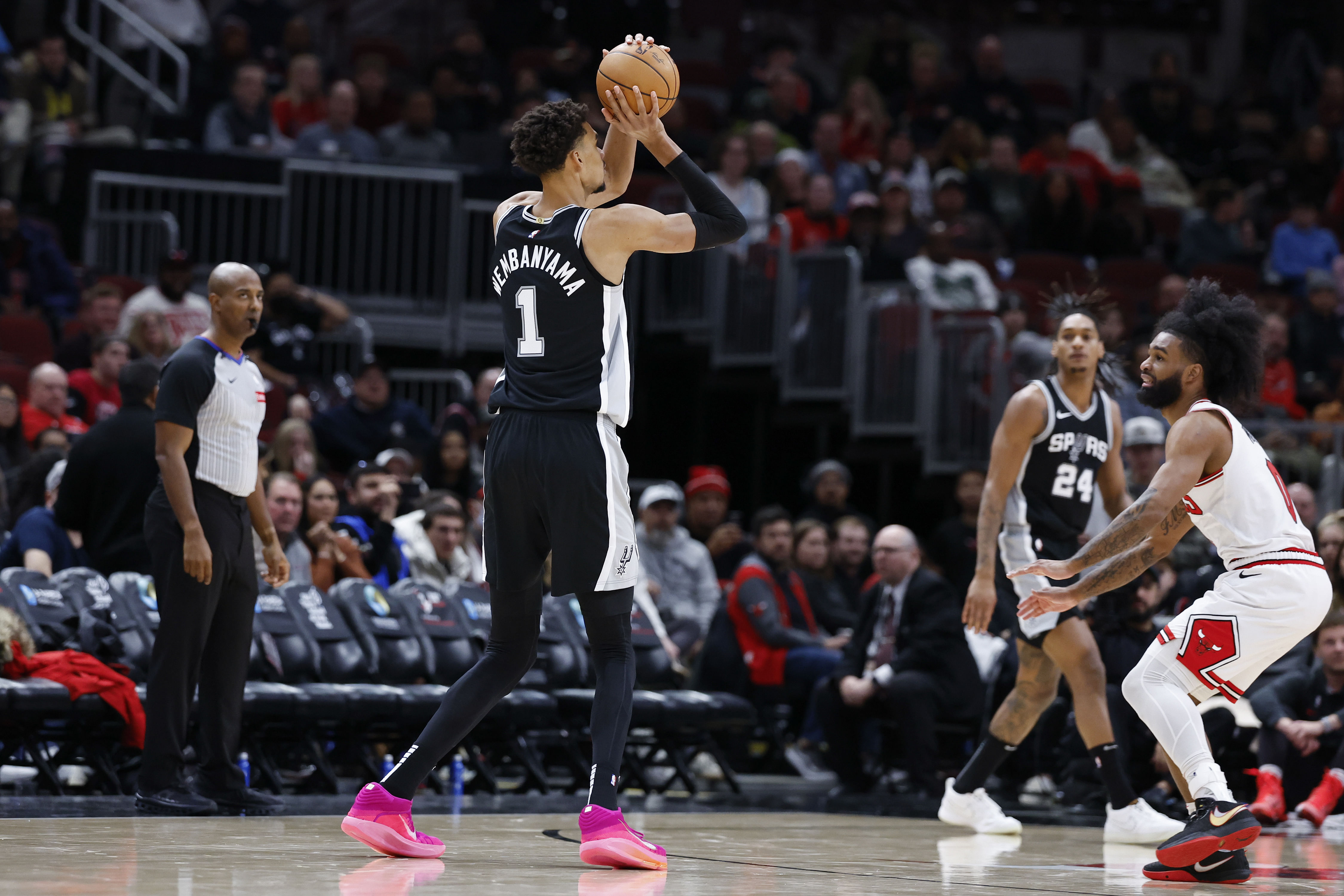 Jan 6, 2025; Chicago, Illinois, USA; San Antonio Spurs center Victor Wembanyama (1) shoots against the Chicago Bulls during the second half at United Center. Mandatory Credit: Kamil Krzaczynski-Imagn Images - Source: Imagn