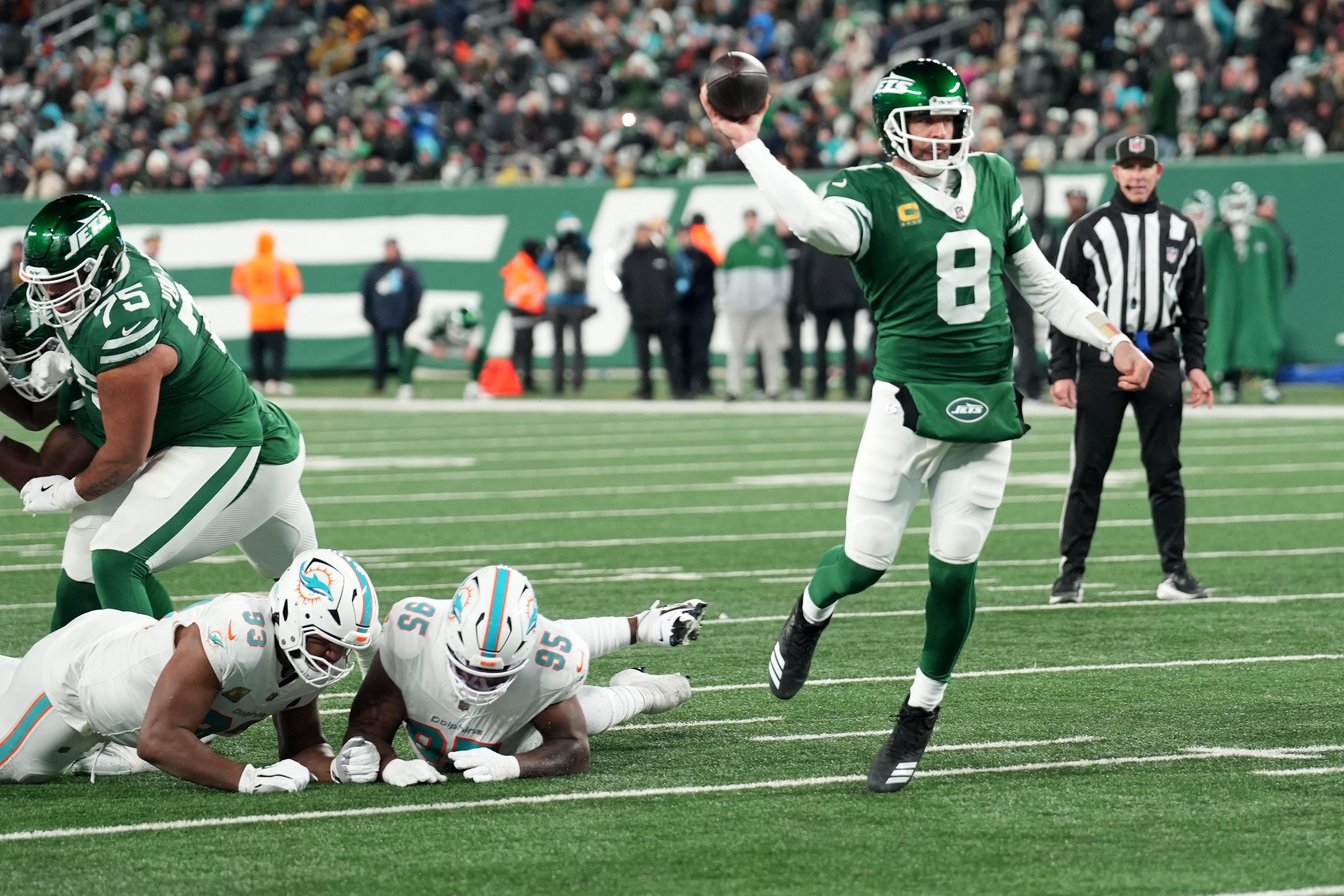 New York Jets quarterback Aaron Rodgers (8) throws his 500th career touchdown pass in the second quarter of the game against the Miami Dolphins on Jan. 5, 2025, in East Rutherford, N.J. - Source: Imagn