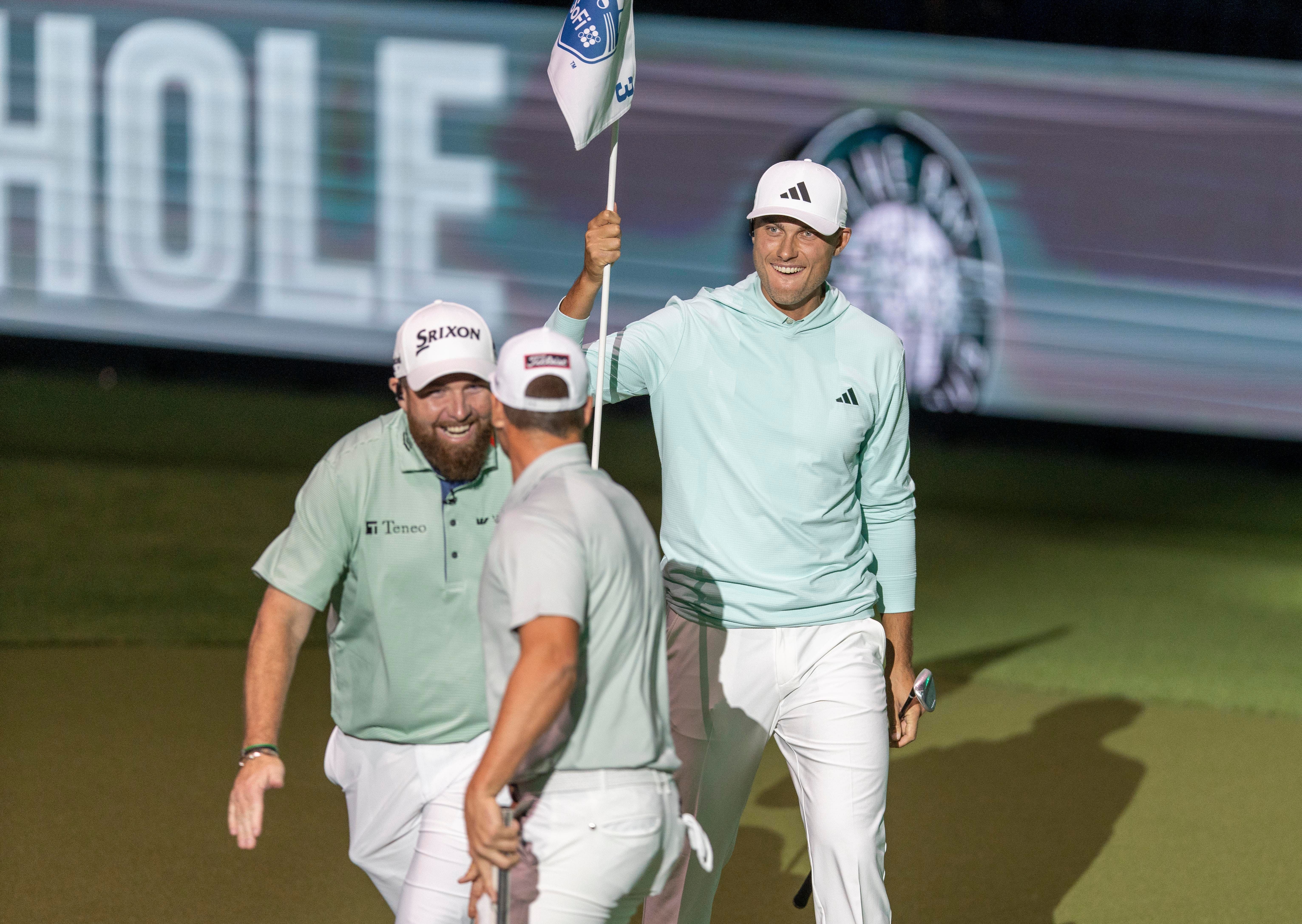 Shane Lowry and Ludvig Aberg of the Bay Golf Club celebrate the putt during the TGL match against New York Golf Club (Image Source: Imagn)