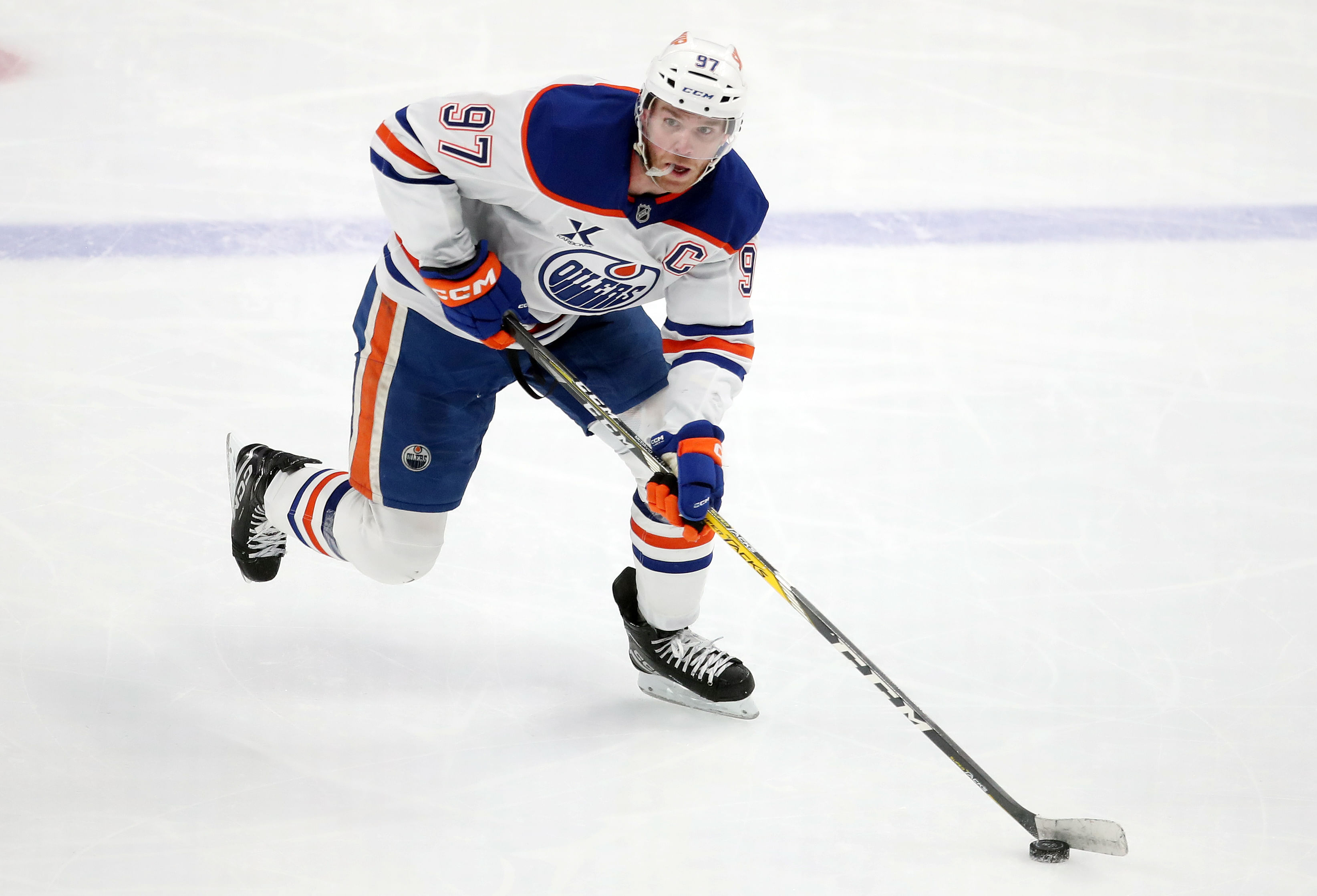 Edmonton Oilers center Connor McDavid (97) skates up ice with the puck against the Pittsburgh Penguins. (Credits: IMAGN)