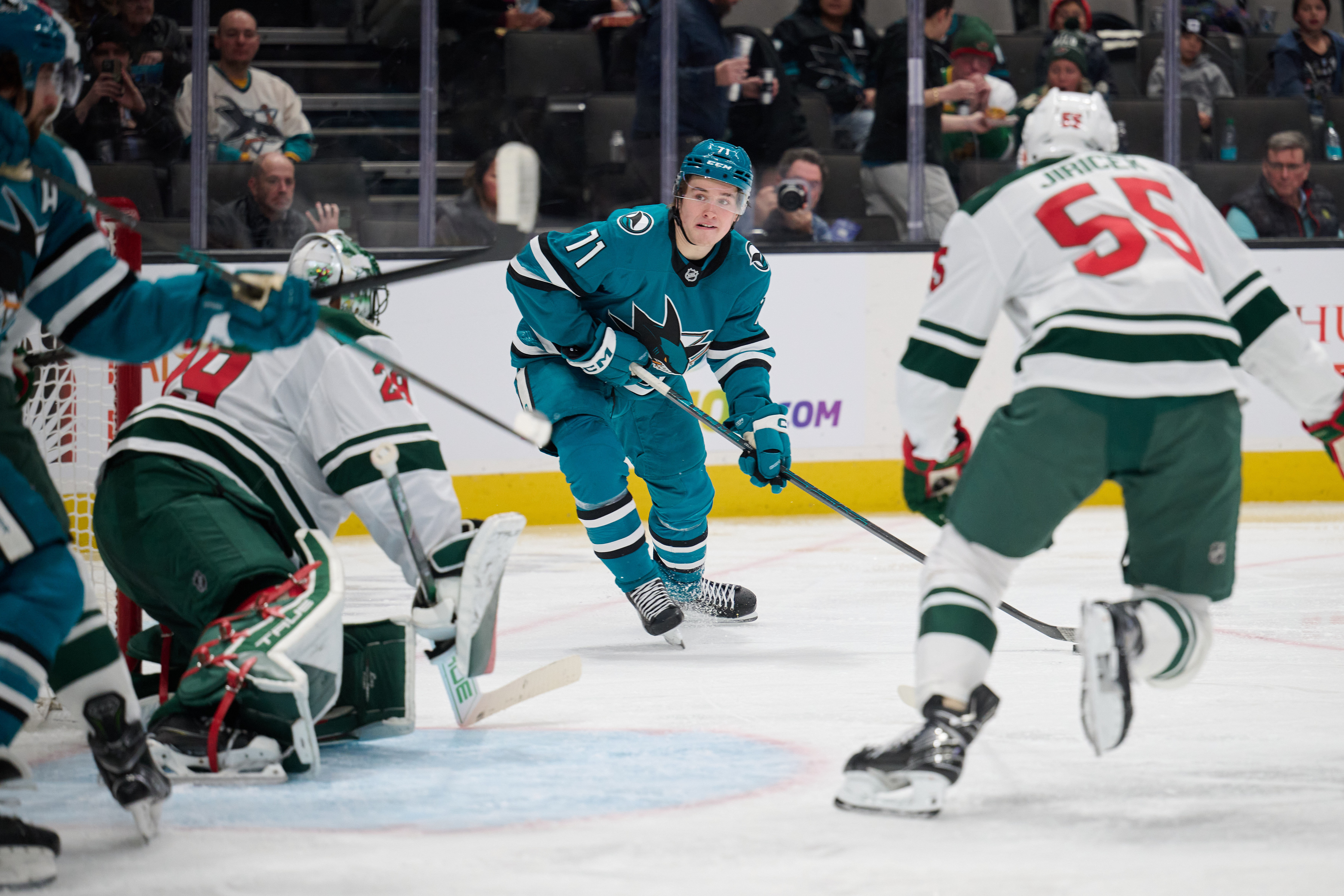 San Jose Sharks center Macklin Celebrini (71) controls the puck against Minnesota Wild goaltender Marc-Andre Fleury (29). (Credits: IMAGN)