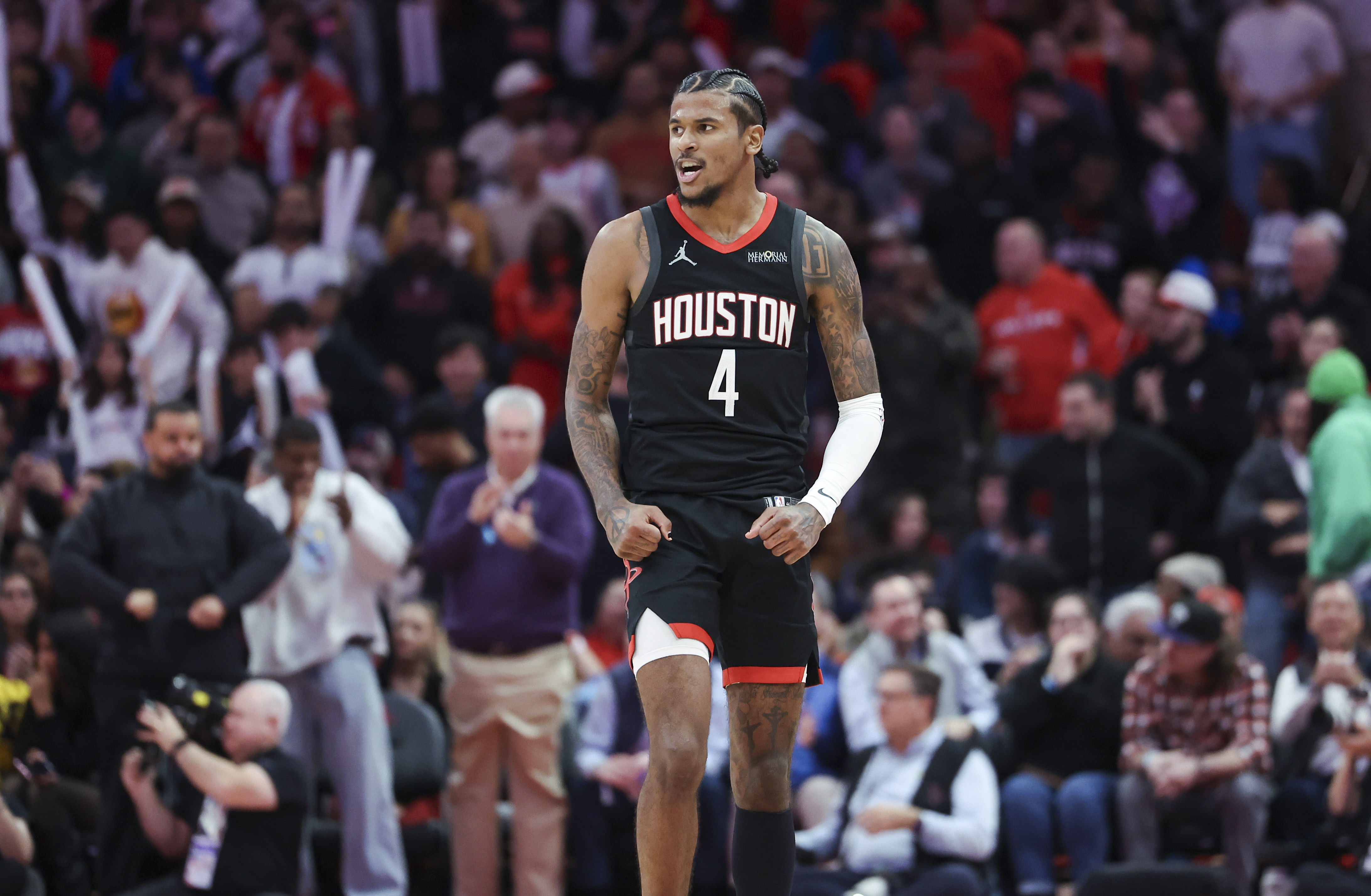 Jan 13, 2025; Houston, Texas, USA; Houston Rockets guard Jalen Green (4) reacts after a play during the second half against the Memphis Grizzlies at Toyota Center. Mandatory Credit: Troy Taormina-Imagn Images - Source: Imagn