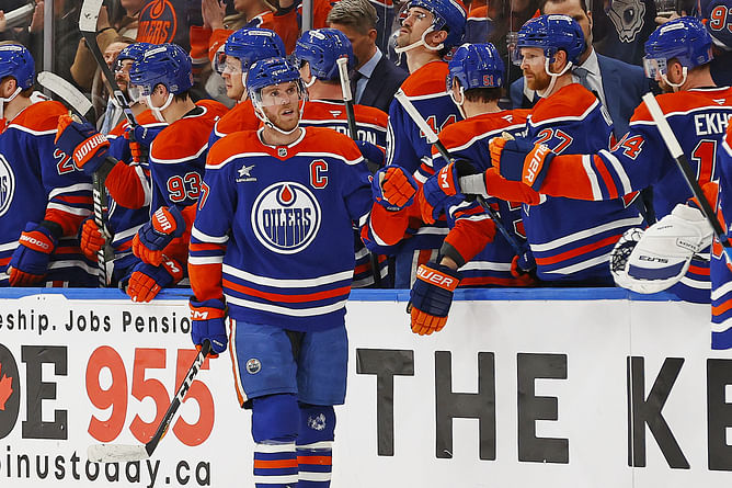 Watch: Connor McDavid shoulder slams Alex Laferriere into the boards, receives toppling retaliation from Kings forward
