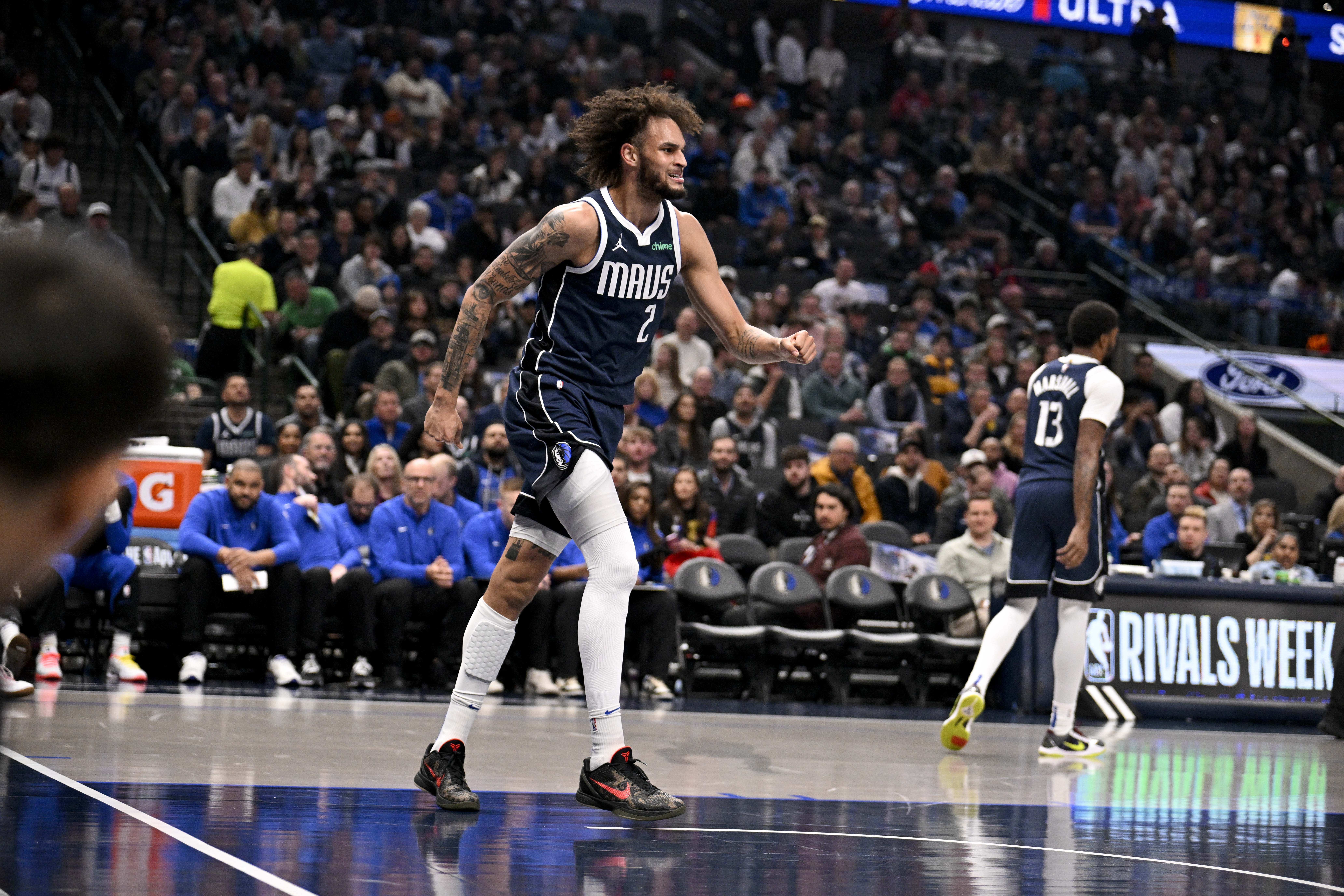 Dallas Mavericks center Dereck Lively II (2) reacts after suffering a possible leg injury during an NBA game. (Credits: IMAGN)