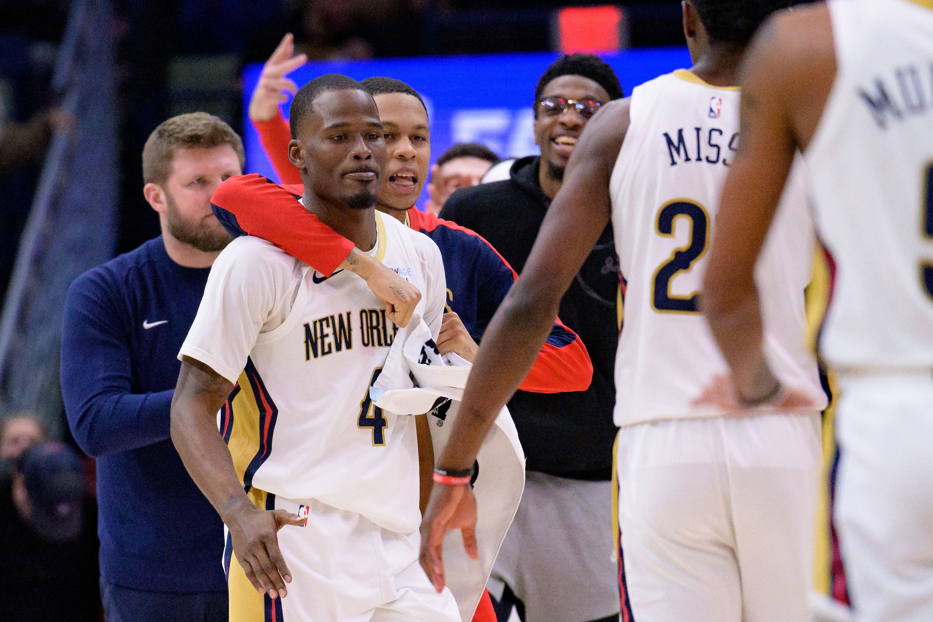 New Orleans Pelicans guard Jordan Hawkins hugs guard Javonte Green after he made a three point against the Dallas Mavericks at Smoothie King Center. Photo Credit: Imagn