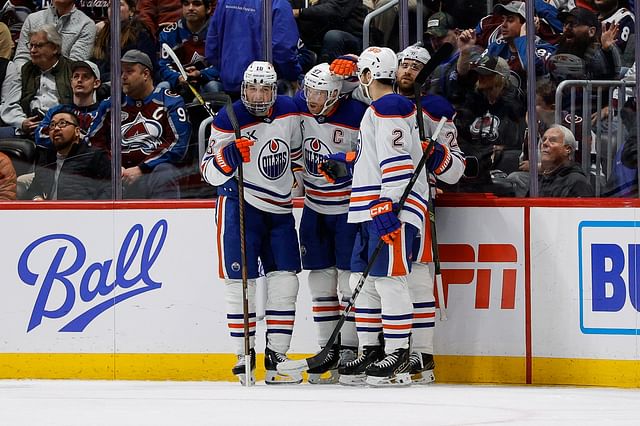 Jan 16, 2025; Denver, Colorado, USA; Edmonton Oilers center Connor McDavid (97) celebrates his goal with left wing Zach Hyman (18) and center Leon Draisaitl (29) and defenseman Evan Bouchard (2) in the second period against the Colorado Avalanche at Ball Arena. Mandatory Credit: Isaiah J. Downing-Imagn Images - Source: Imagn