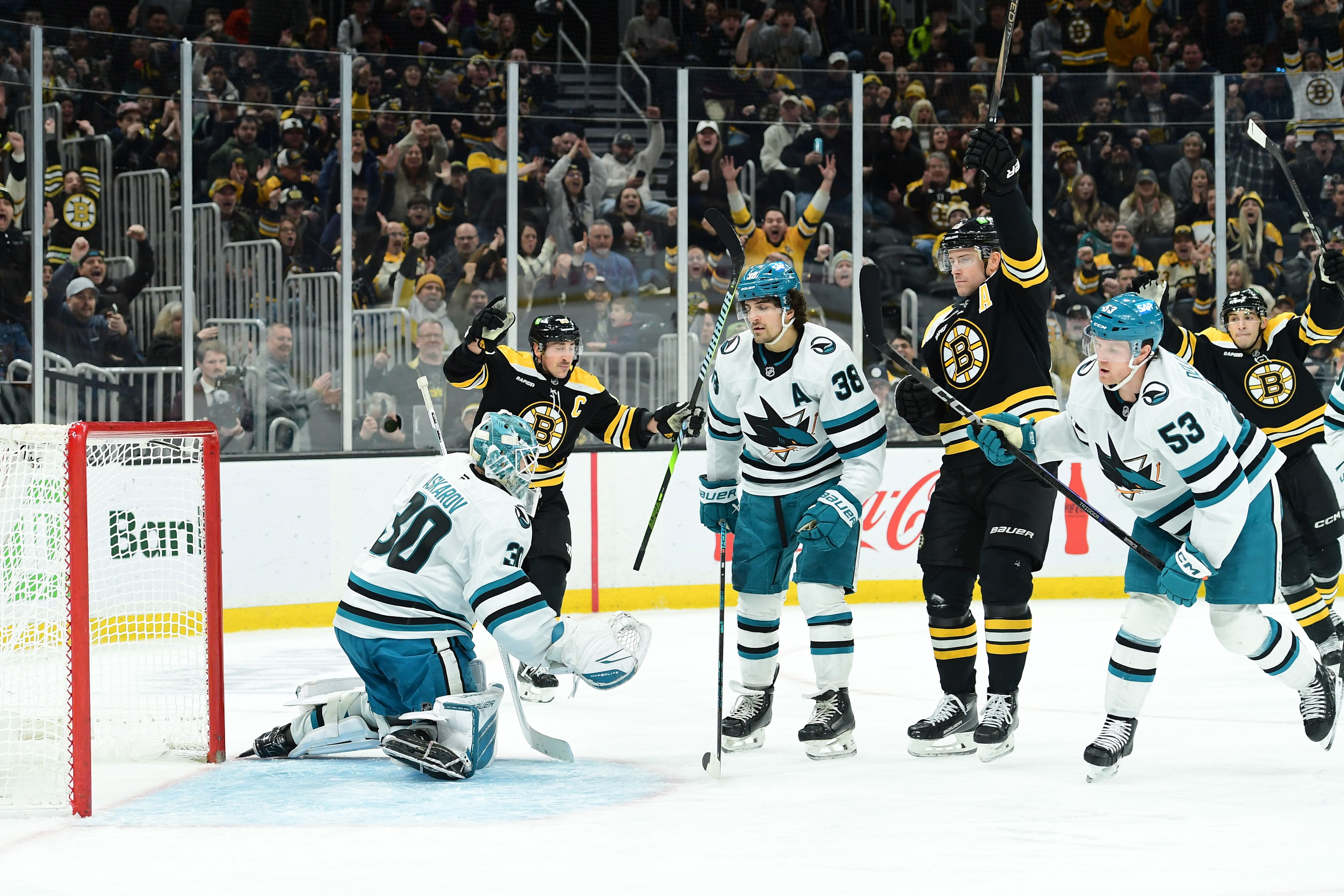 NHL: Marchand, Coyle, and Poitras celebrate goal vs San Jose - Source: Imagn