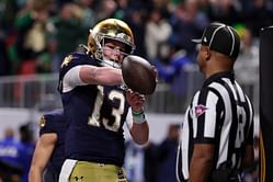 Riley Leonard flexes bible-inspired wristband after Notre Dame takes lead with his first TD score in CFP natty