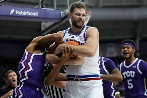 Kansas Jayhawks center Hunter Dickinson (#1) battles for possession of the ball against TCU Horned Frogs forward Trazarien White (13) during the second half at Schollmaier Arena. Photo: Imagn