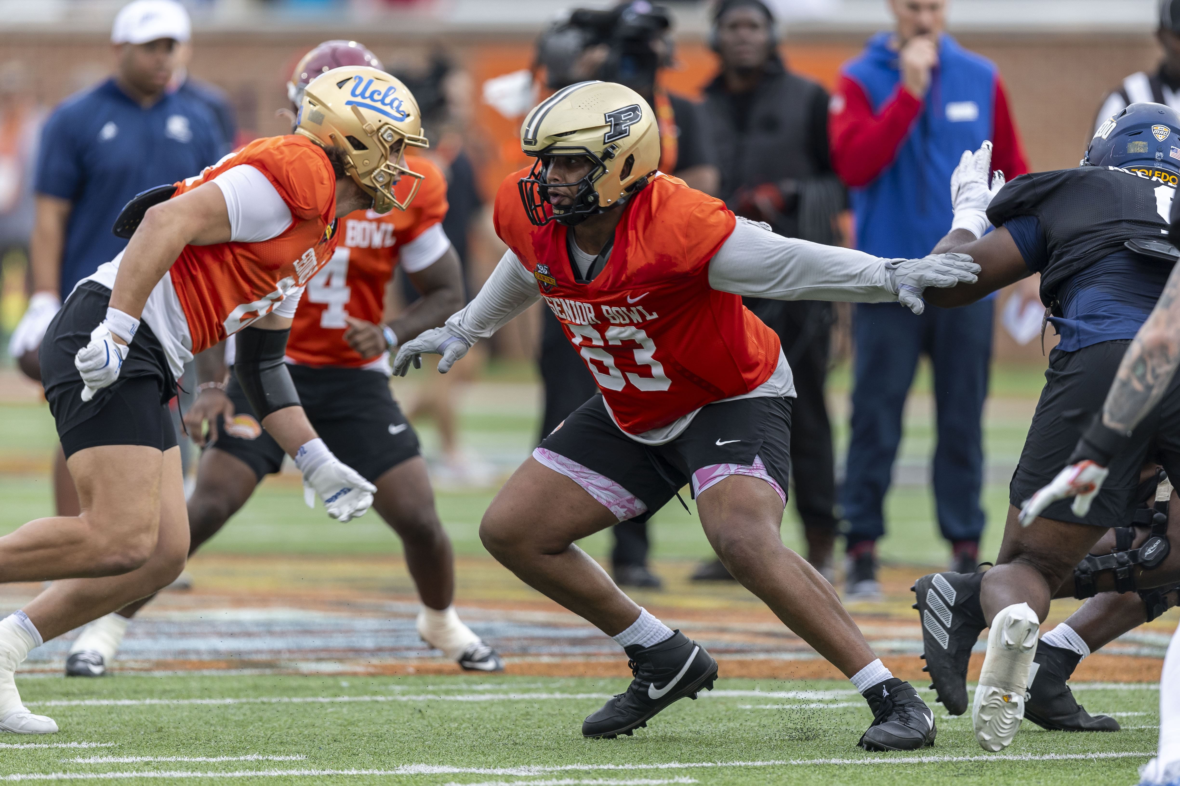 After a season spent on a 1-11 Purdue squad, offensive lineman Marcus Mbow has been a Senior Bowl star this week. (Photo Credit: IMAGN)