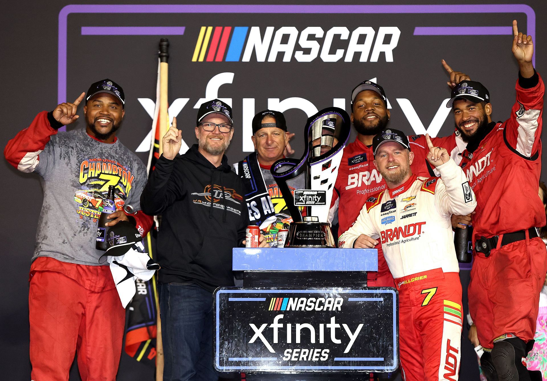 Justin Allgaier, driver of the #7 BRANDT Chevrolet, celebrates with NASCAR Hall of Famer and JR Motorsports owner, Dale Earnhardt Jr. and crew - Source: Getty Images