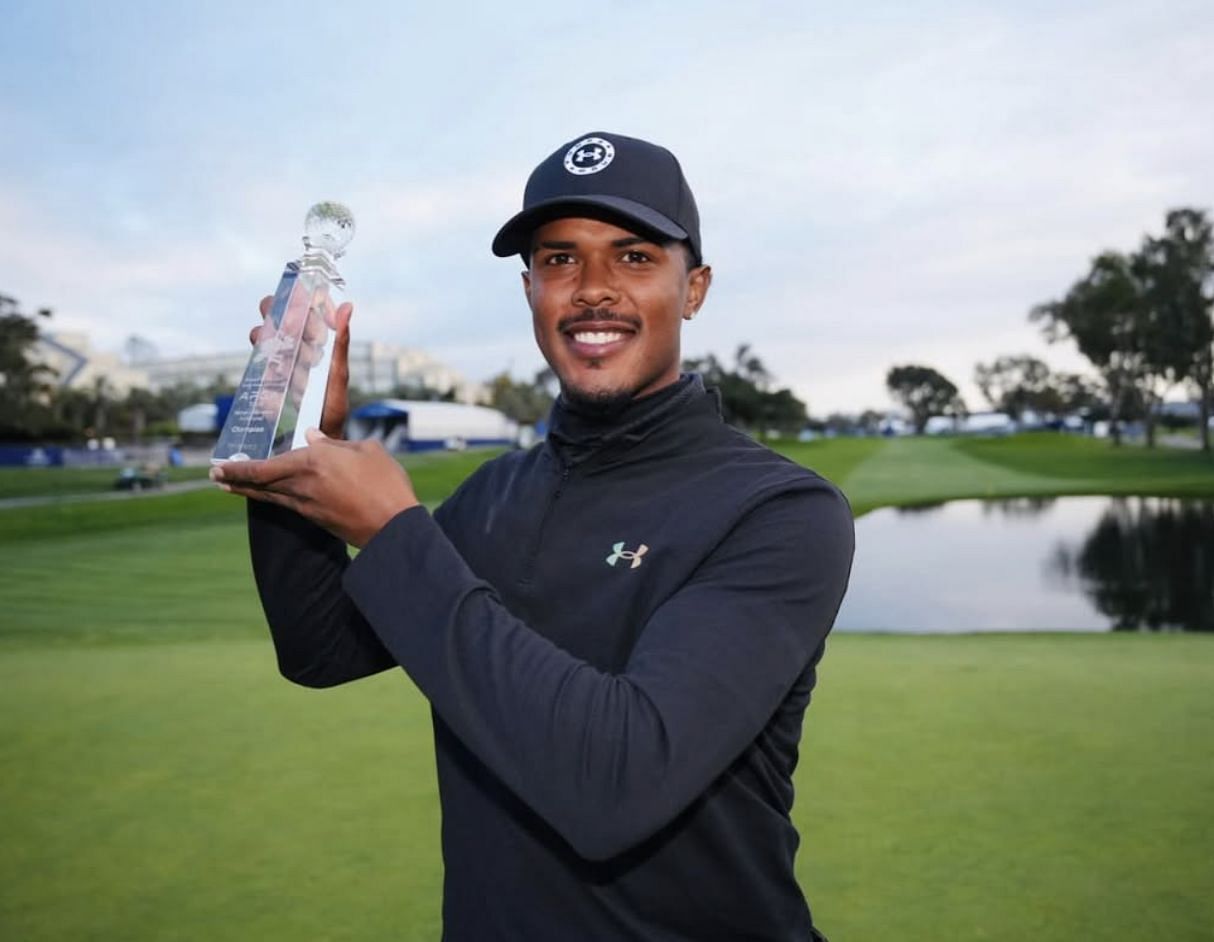 Kieron van Wyk poses with the APGA Farmers Insurance Invitational trophy (image via instagram@APGA Tour)