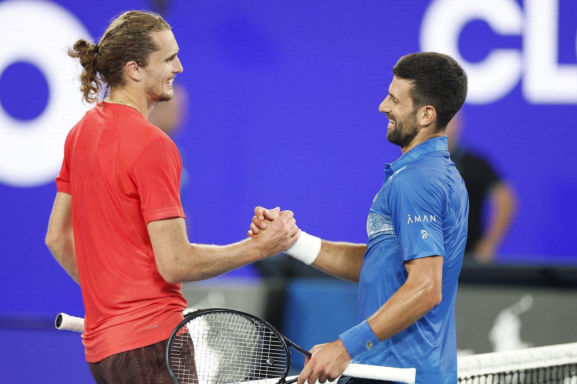 Alexander Zverev(red) and Novak Djokovic at 2025 Australian Open pre match - Source: Getty