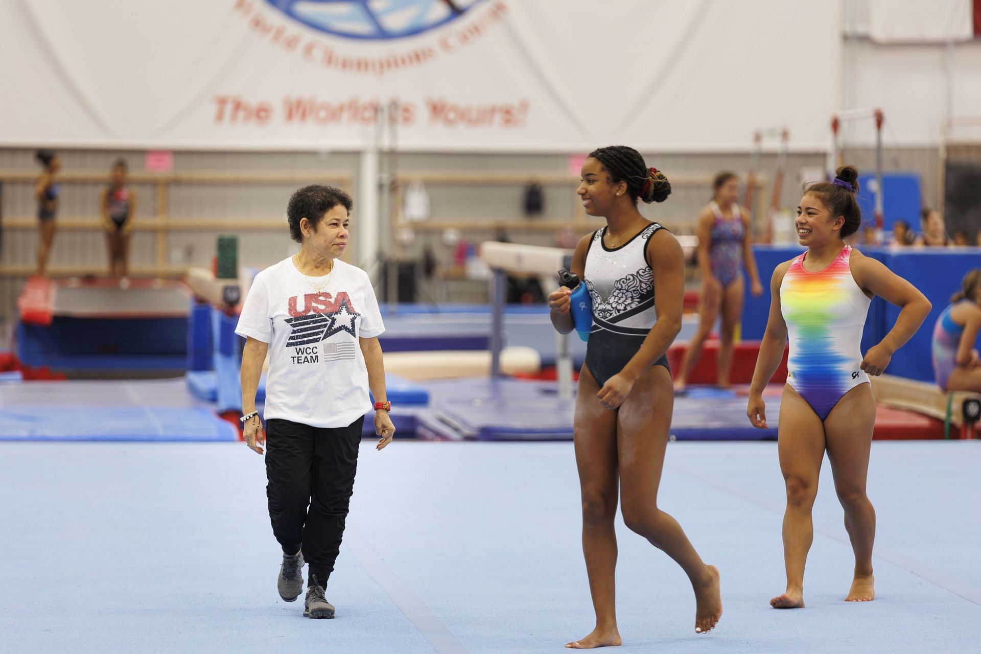 Simone Biles&#039; mother with gymnasts at the World Champions Center - (Source: Getty)