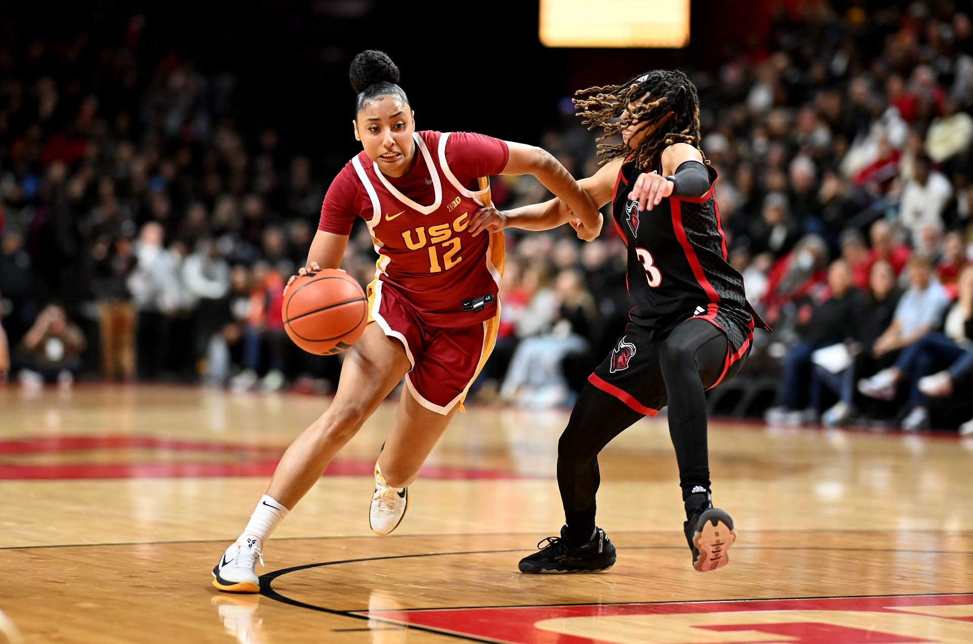 JuJu Watkins (#12) of the USC Trojans handles the ball in the second quarter against Mya Petticord (#3) of the Rutgers Scarlet Knights at Jersey Mike&#039;s Arena on January 05, 2025. Photo: Getty