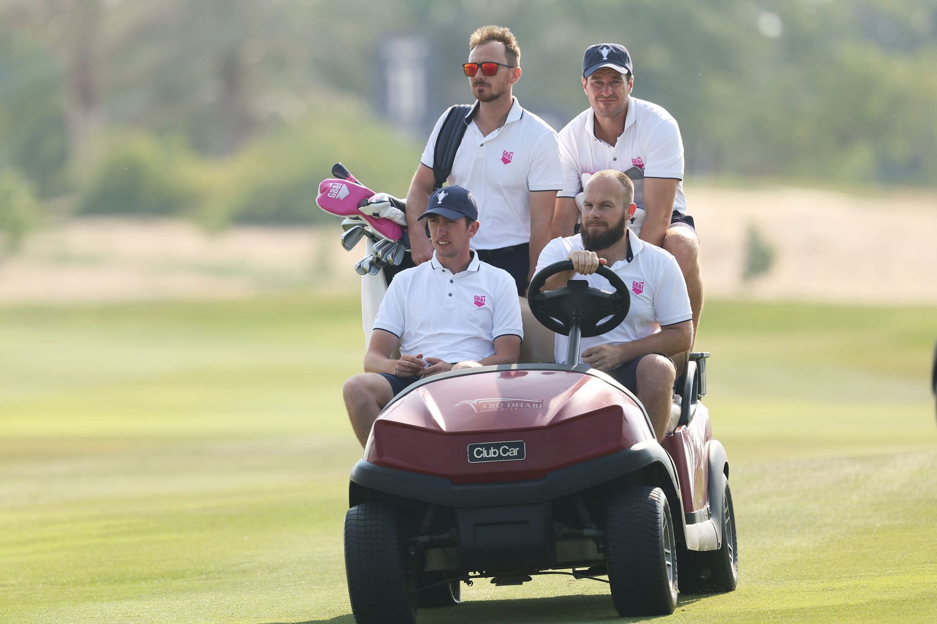 Tyrrell Hatton and Tom Mckibbin with their caddies (Source: Getty)