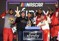 AVONDALE, ARIZONA - NOVEMBER 09: Justin Allgaier, driver of the #7 BRANDT Chevrolet, celebrates with NASCAR Hall of Famer and JR Motorsports owner, Dale Earnhardt Jr. - Source: Getty