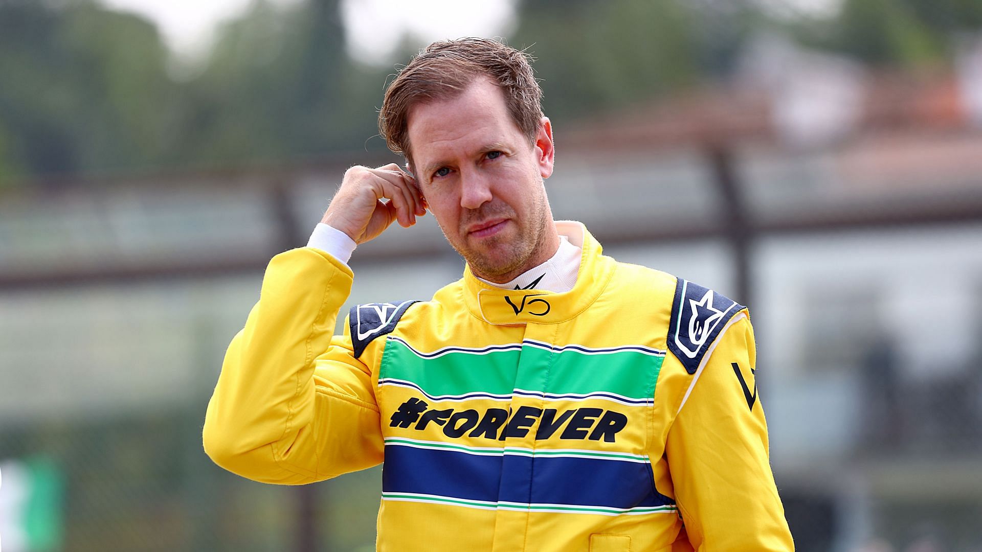 IMOLA, ITALY - MAY 19: Sebastian Vettel prepares to drive the McLaren MP4/8 of Ayrton Senna on track prior to the F1 Grand Prix of Emilia-Romagna at Autodromo Enzo e Dino Ferrari Circuit on May 19, 2024 in Imola, Italy. (Photo by Bryn Lennon - Formula 1/Formula 1 via Getty Images) - Source: Getty