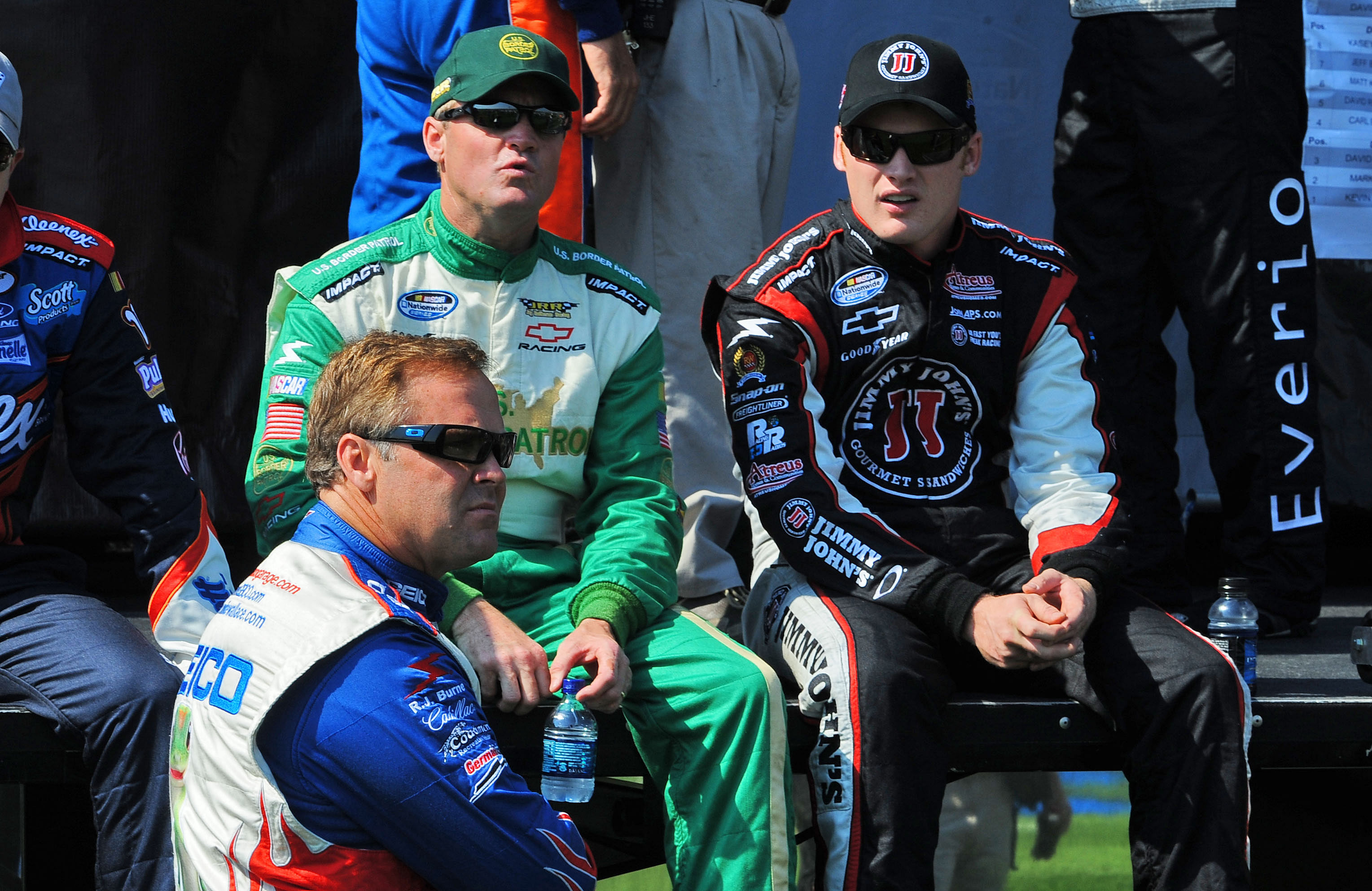 Mike Wallace (left), Kenny Wallace (center) and Steve Wallace at Kansas Speedway on Sept. 27, 2008. Source: Imagn