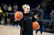 Paige Bueckers warms up before a game for the UConn Huskies. (Credits: Getty)