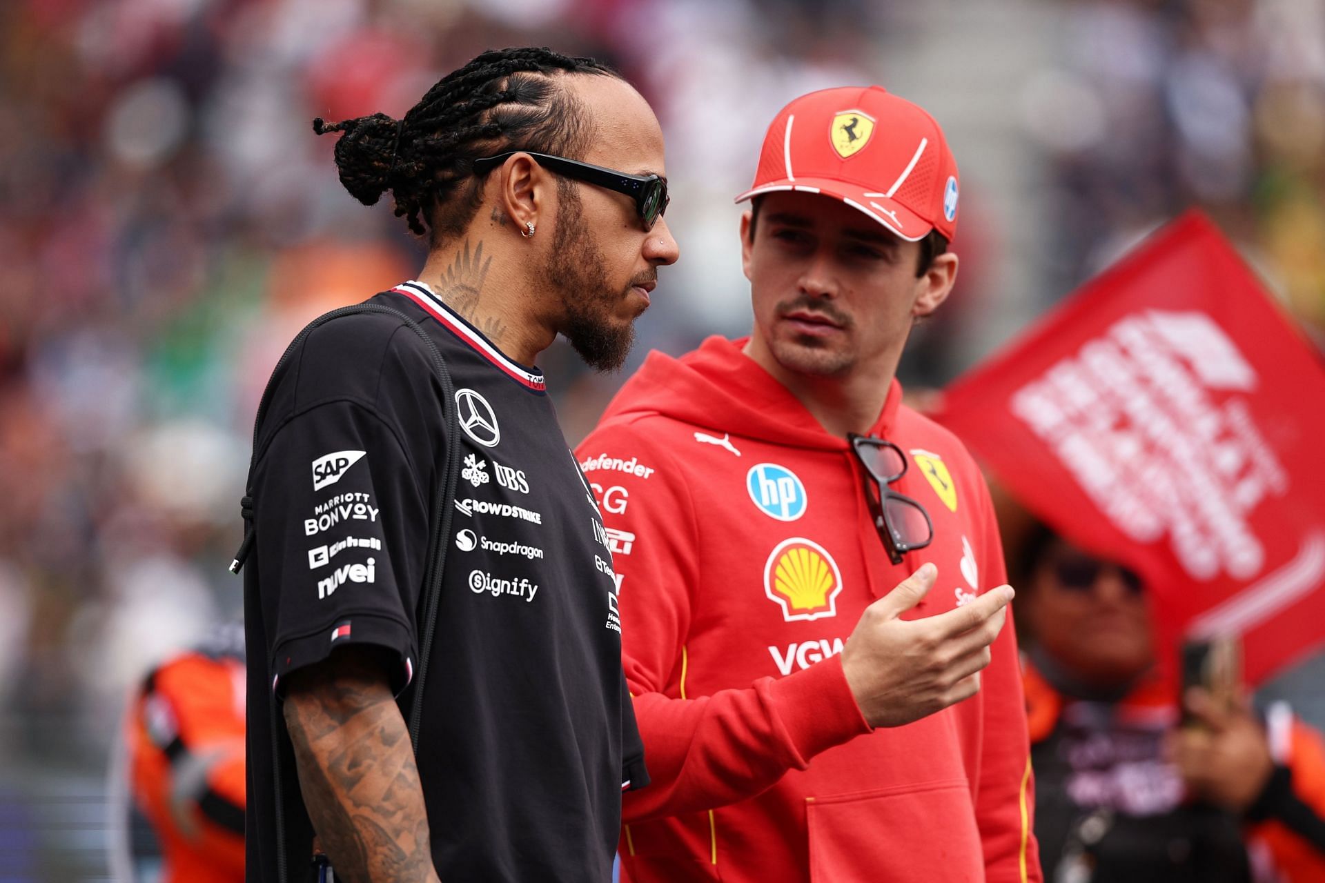 Lewis Hamilton (L) with Charles Leclerc (Image Source: Getty)