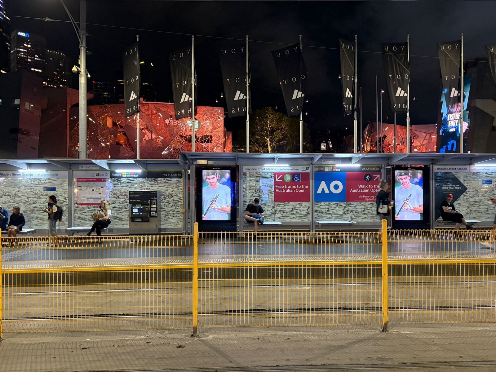 Stefanos Tsitsipas on billboards during the 2025 Australian Open.