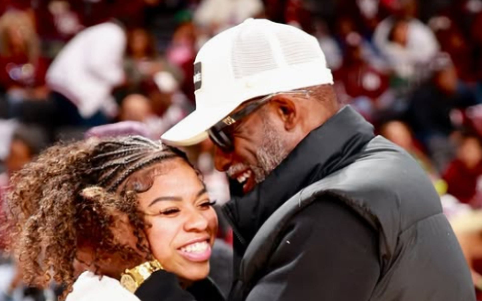 Shelomi Sanders (left) shares photos with Deion Sanders (right) [Image credits: Getty Images]