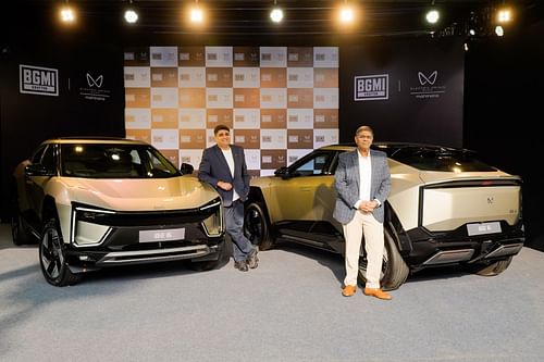 Seddharth Merrotra (Left, Krafton India) and Veejay Nakra, (Right, Mahindra and Mahindra Ltd.) pose alongside the BE 6 at a press event in Mumbai (Image via Krafton)