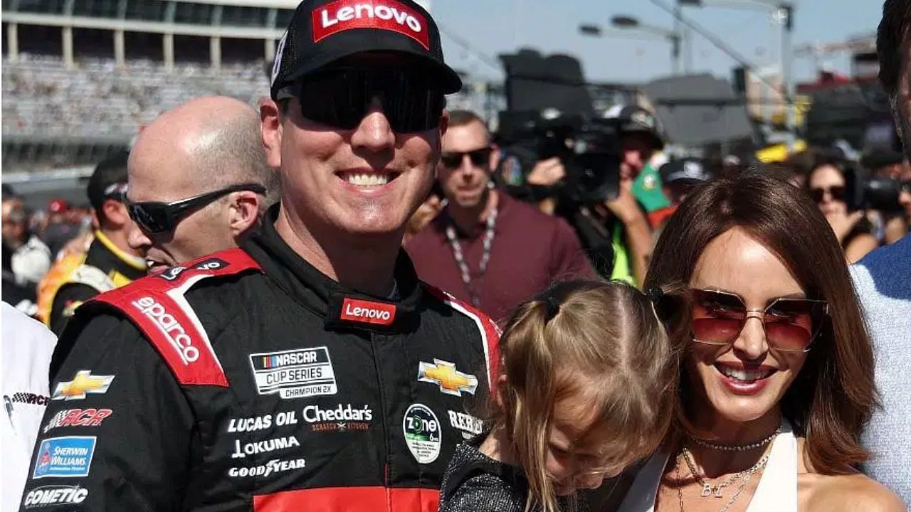 Kyle Busch and his wife, Samantha Busch at Charlotte Motor Speedway (via Getty)