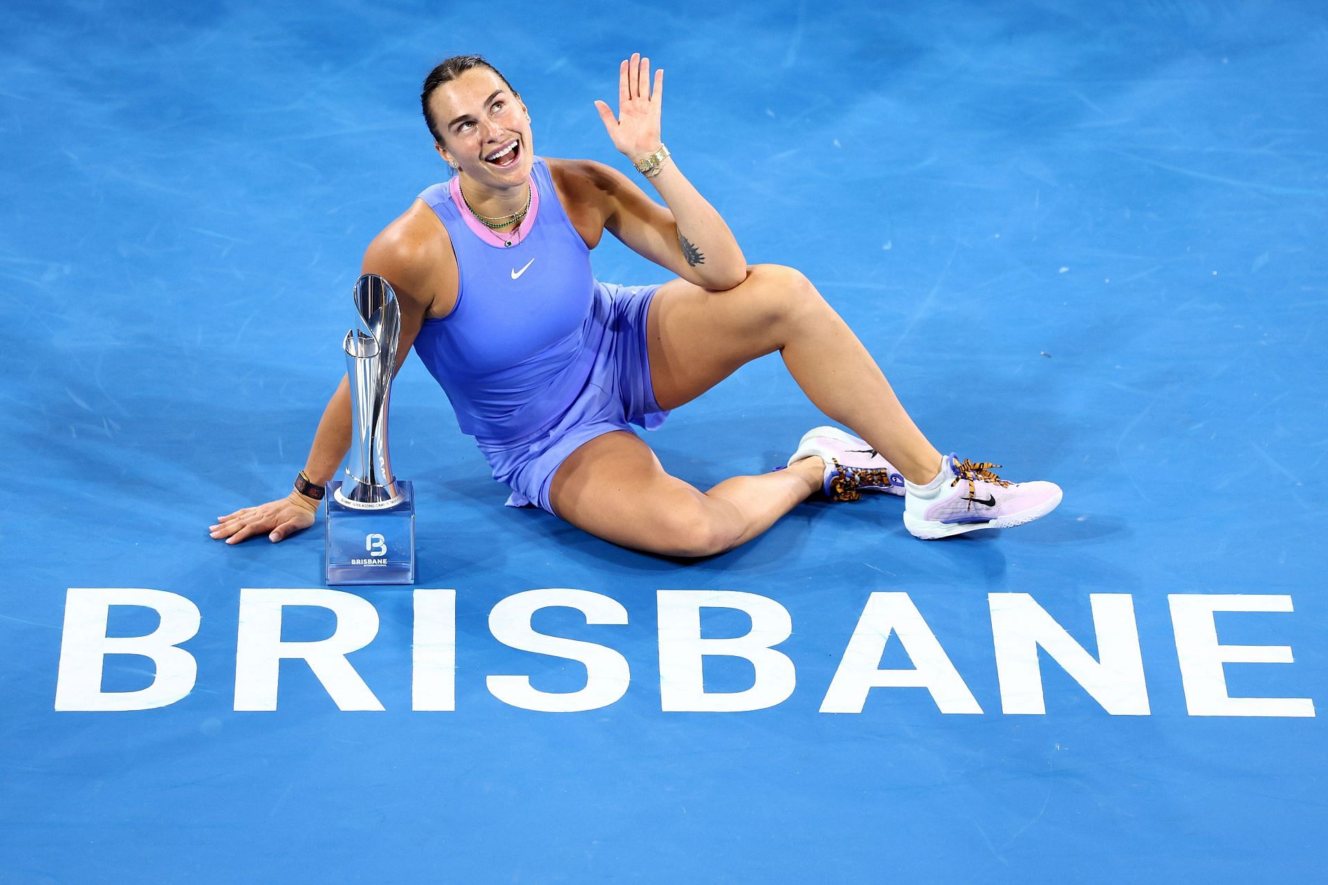 Aryna Sabalenka poses with the Brisbane trophy