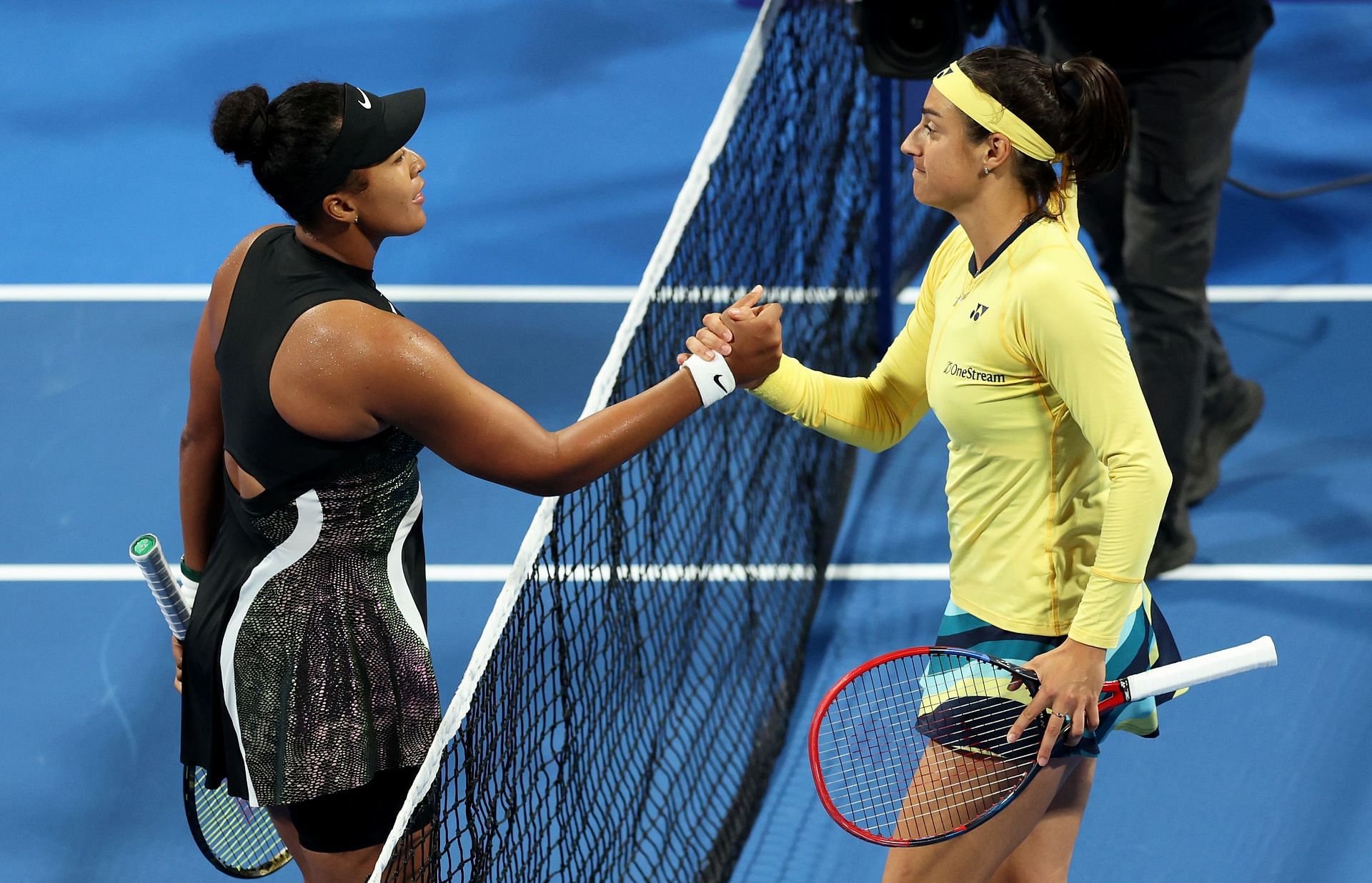 Naomi Osaka (L) and Caroline Garcia at the Qatar TotalEnergies Open (Image Source: Getty)