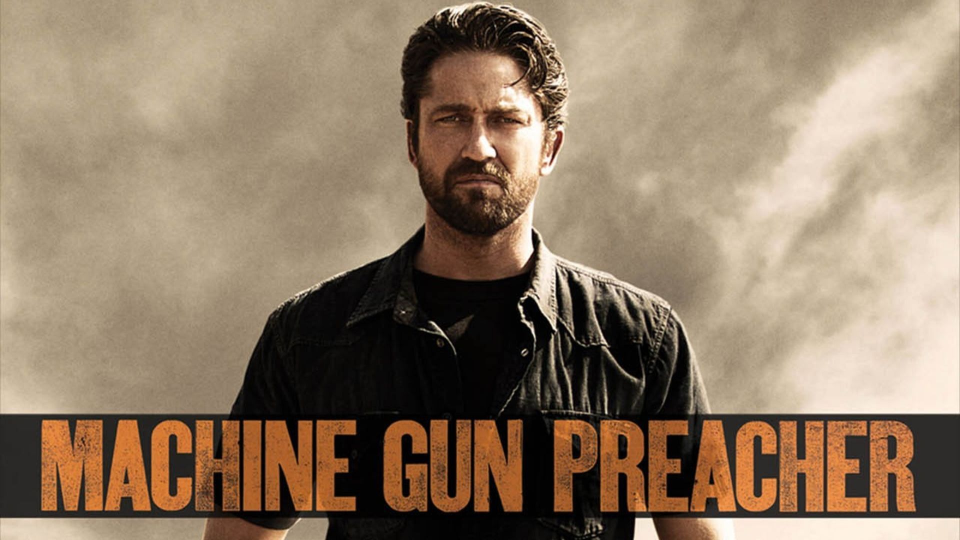 In addition to Gerard Butler, it also star Michelle Monaghan, and Michael Shannon (Image via Machine Gun Preacher Official Website)