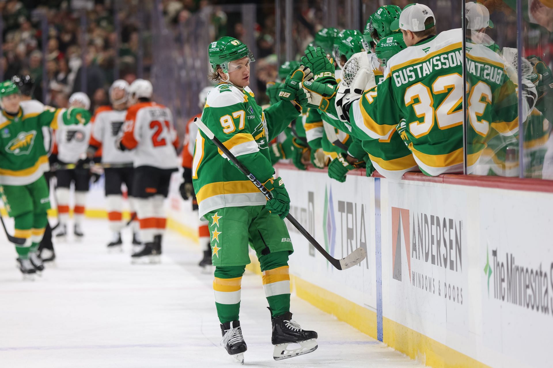 Minnesota Wild left wing Kirill Kaprizov (97) is congratulated by teammates after a goal. (Credits: Getty)