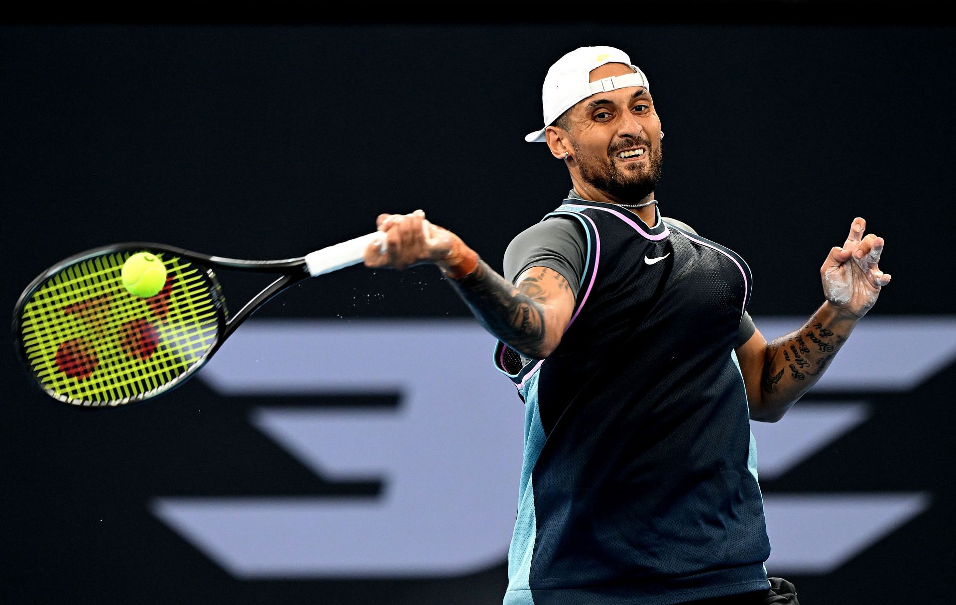 Nick Kyrgios hits a forehand at Brisbane (Image via Getty)