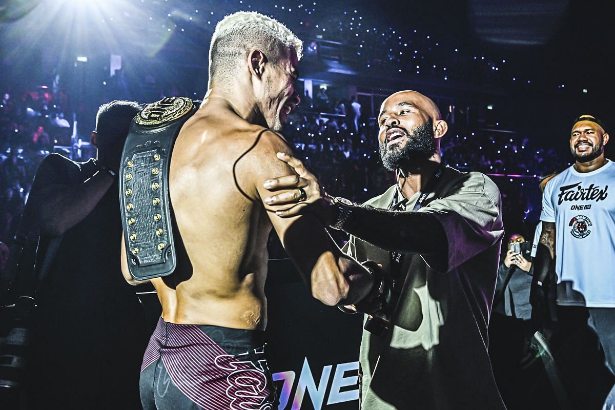 Fabricio Andrade congratulated by Demetrious Johnson | Image credit: ONE Championship