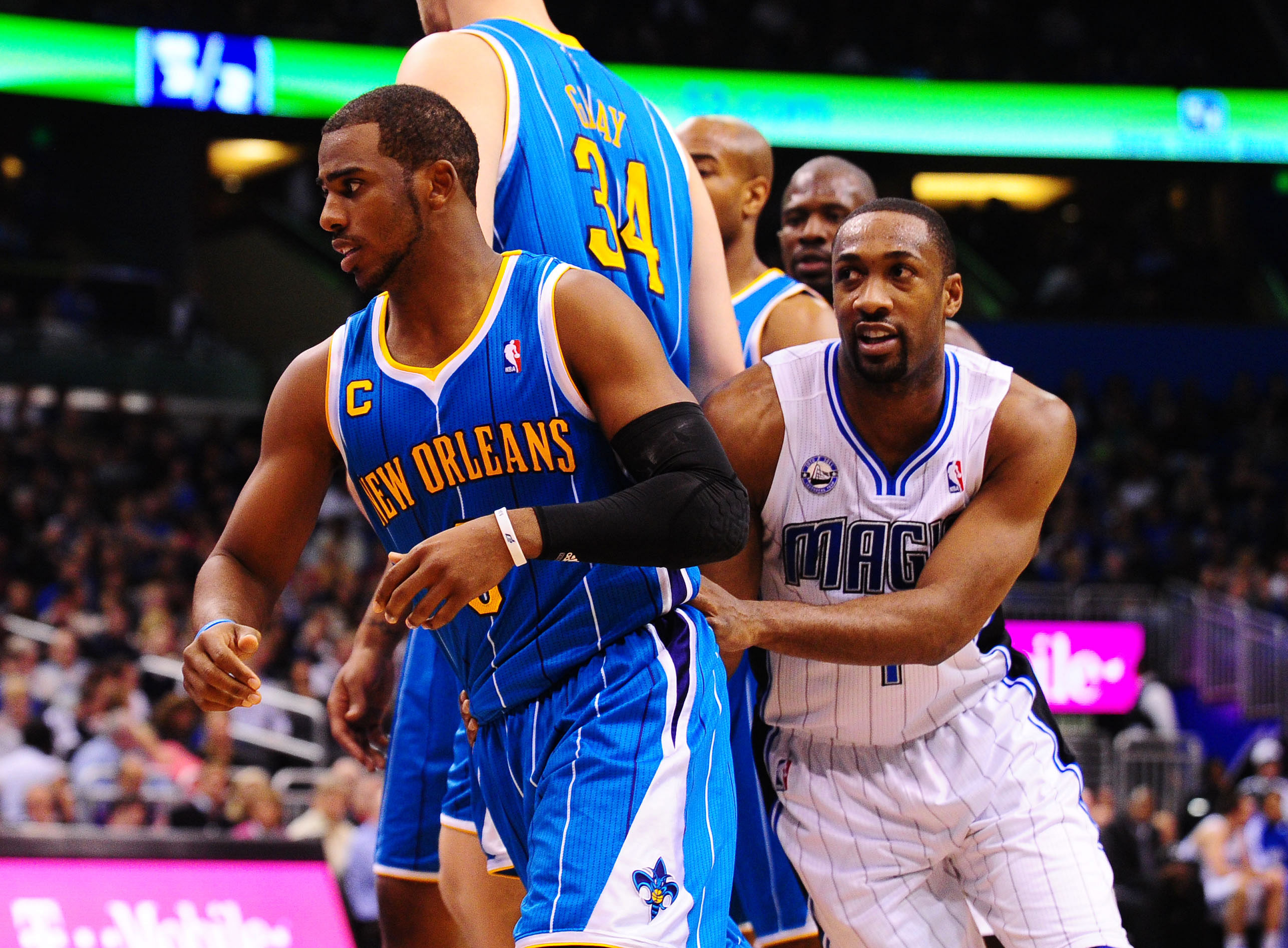 Feb. 11, 2011; Orlando, FL, USA; New Orleans Hornets guard (3) Chris Paul against Orlando Magic guard (1) Gilbert Arenas at the Amway Center. The Hornets defeated the Magic 99-93. Mandatory Credit: Mark J. Rebilas-Imagn Images - Source: Imagn