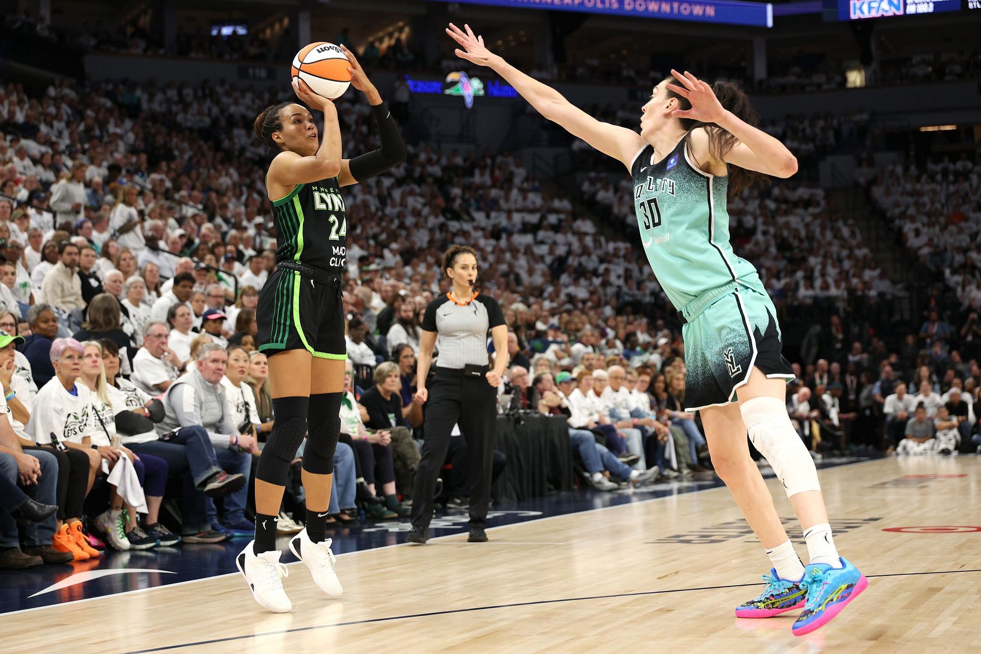 Napheesa Collier, #24 of the Minnesota Lynx, shoots the ball against Breanna Stewart, #30 of the New York Liberty, during their WNBA matchup. (Credits: Getty)