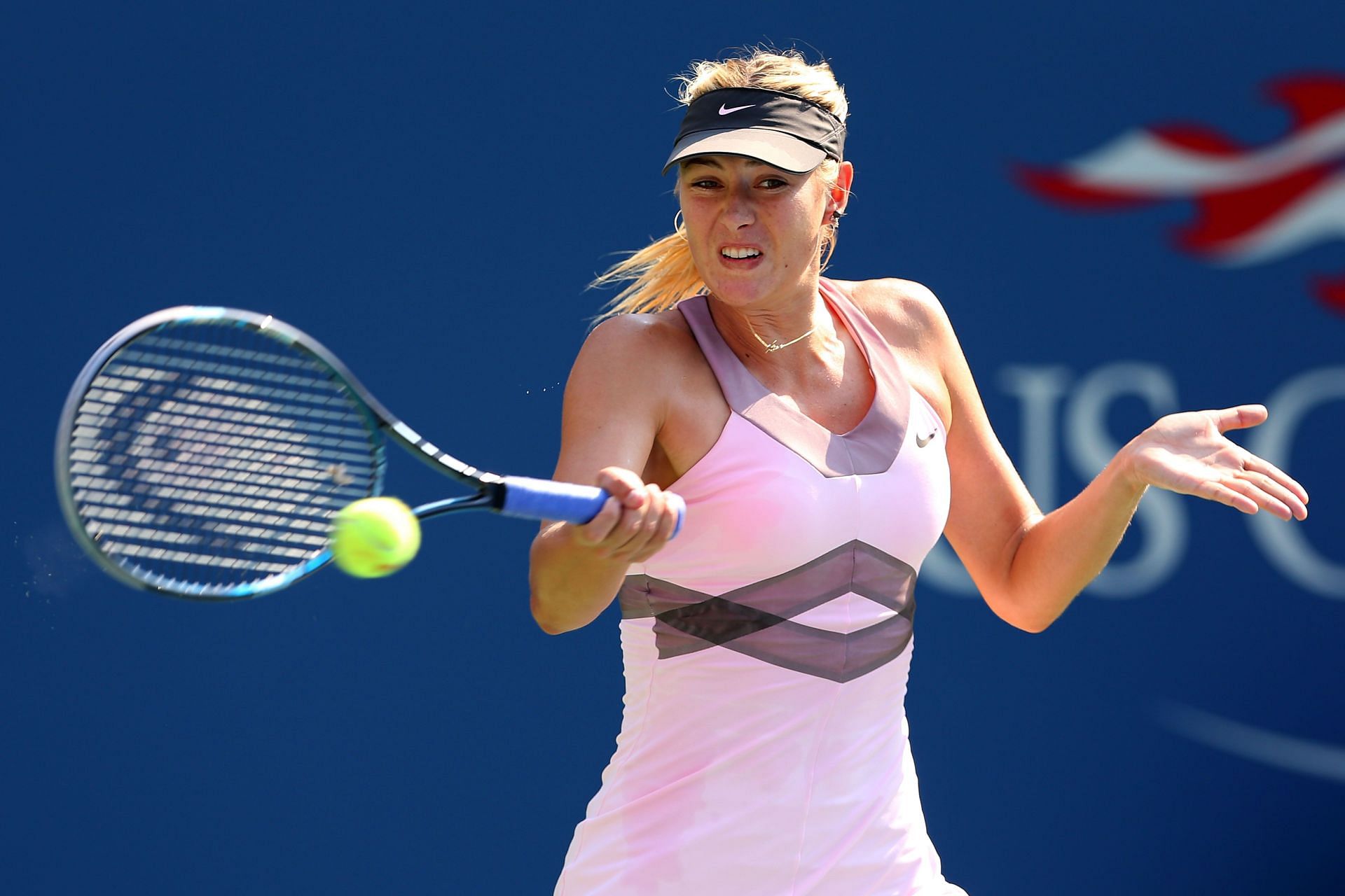 Maria Sharapova hits a forehand at US Open 2012