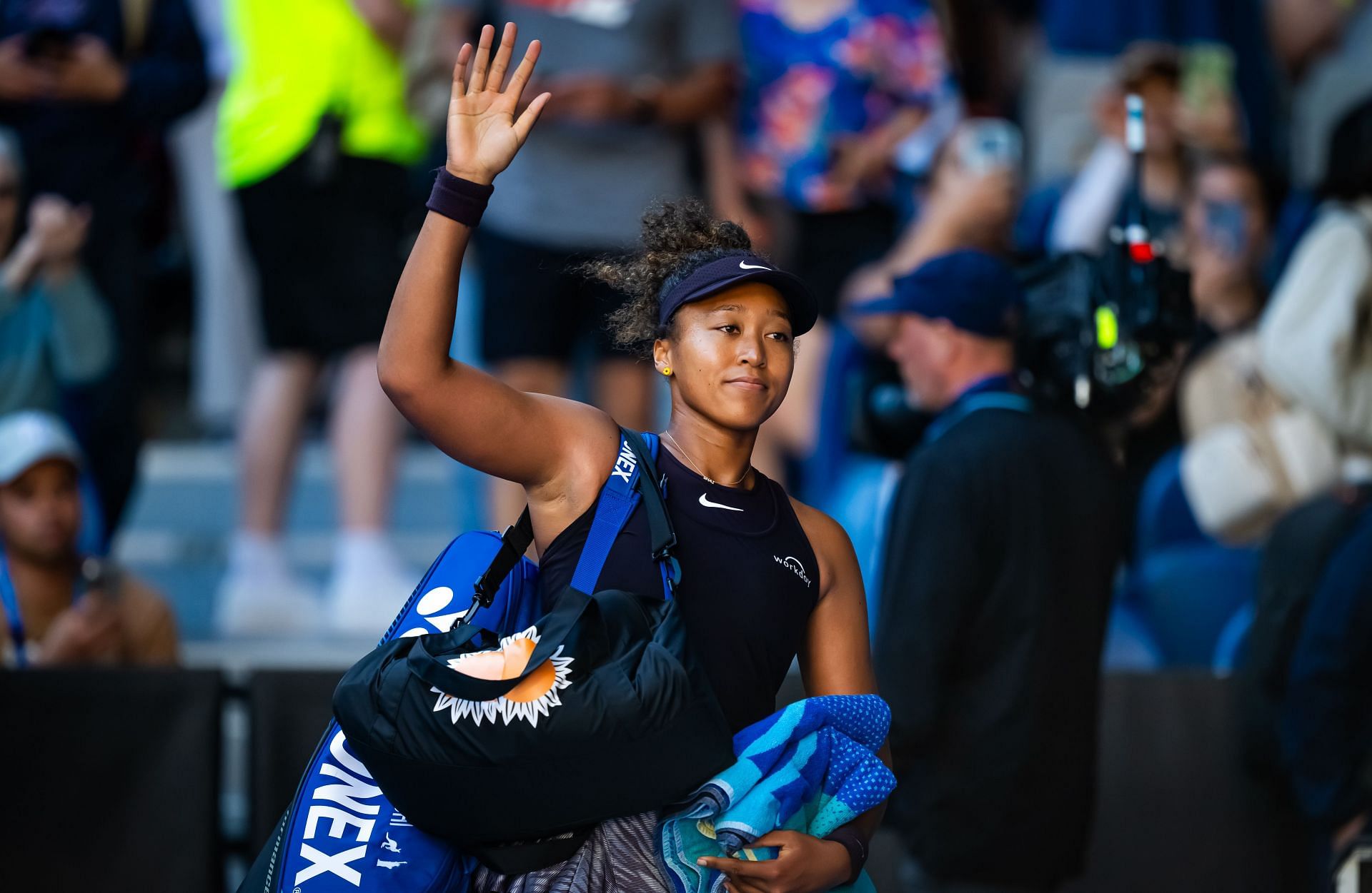 Naomi Osaka walks off the court after retiring during her match against Belinda Bencic at the 2025 Australian Open. Source: Getty