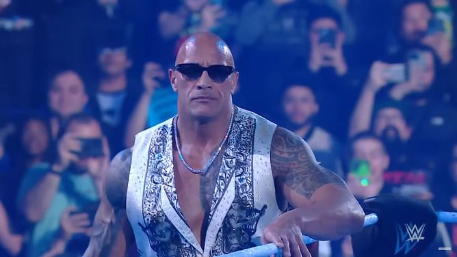 The Rock's former real-life rival sends him a two-word message, three years after settling their beef