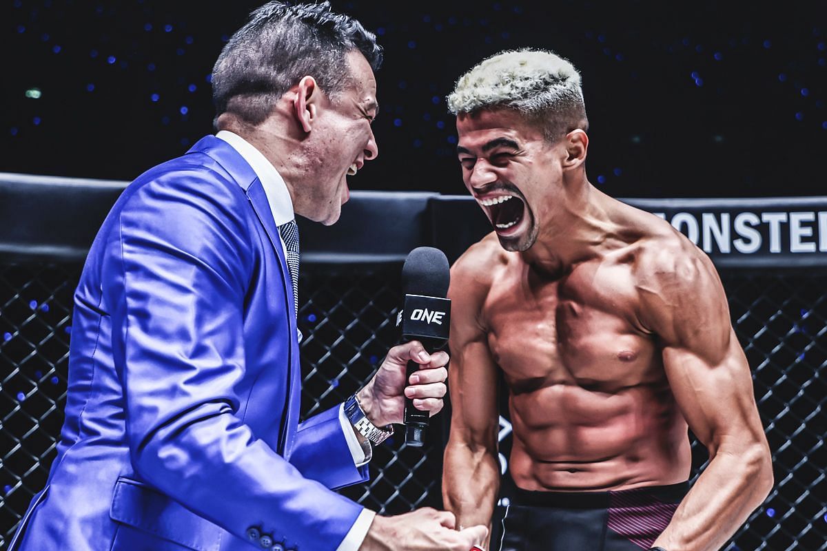 Fabricio Andrade (R) receieves the good news from Mitch Chilson | Image by ONE Championship