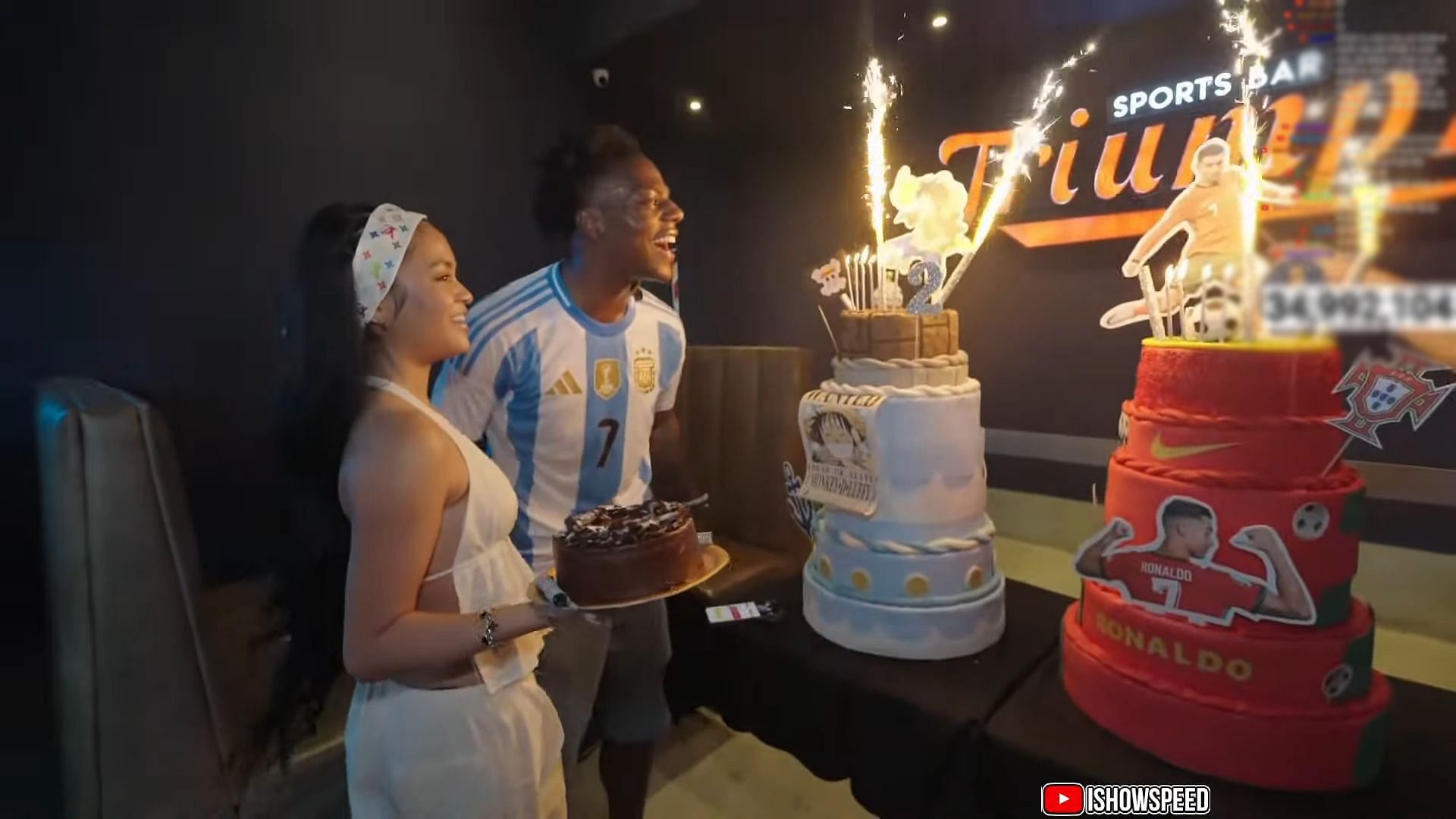 The streamer celebrates turning 20 with the two cakes during the Argentina stream birthday with girlfriend Vanessa (Image via IShowSpeed/YouTube)