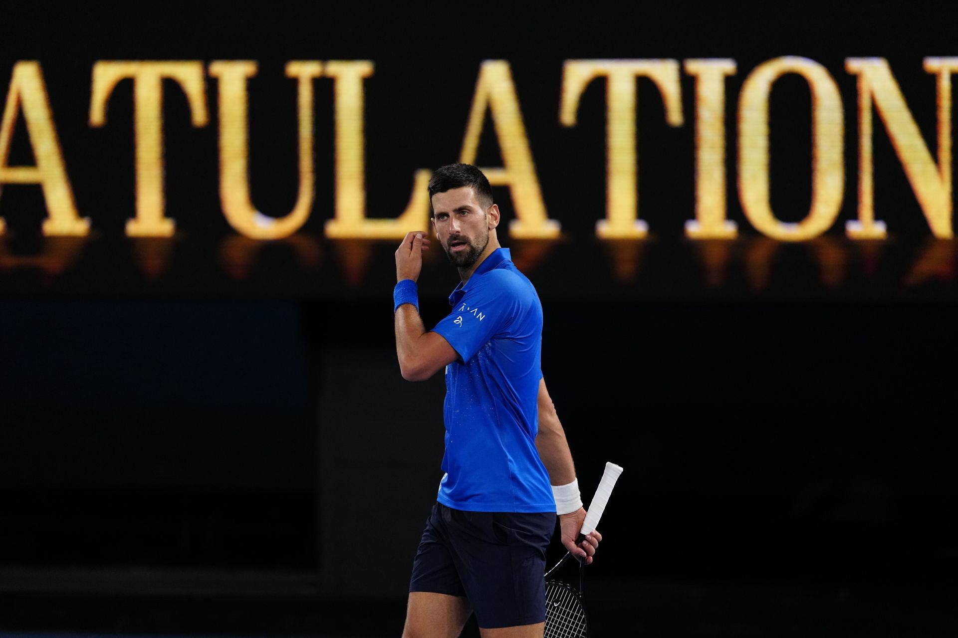 Novak Djokovic looks on during his QF match at Australian Open 2025